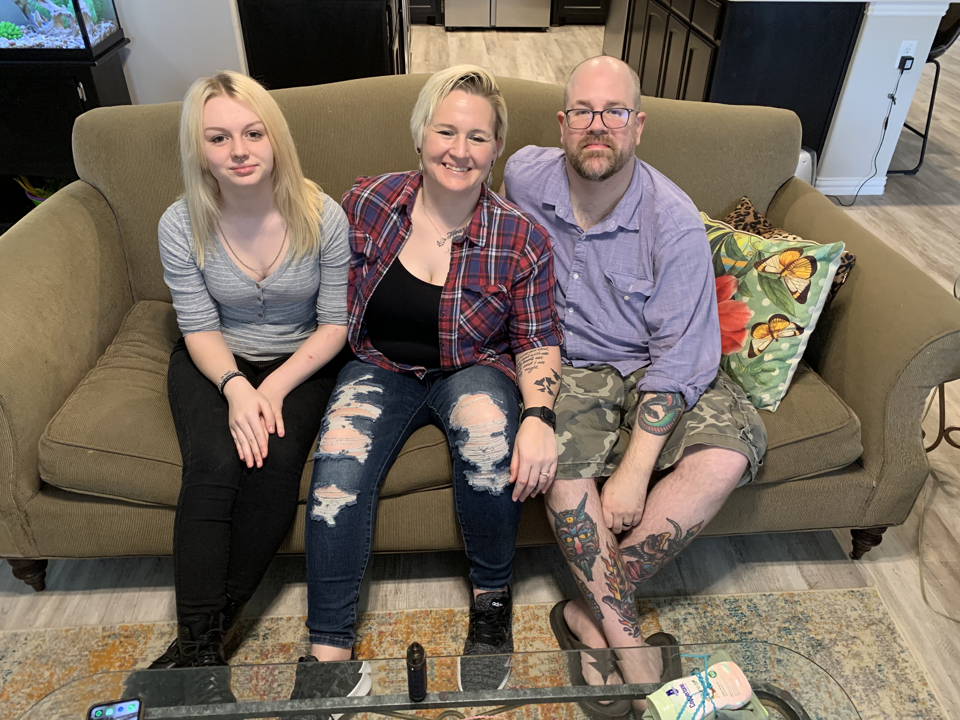 Sara Corcoran, center, and her daughter and husband