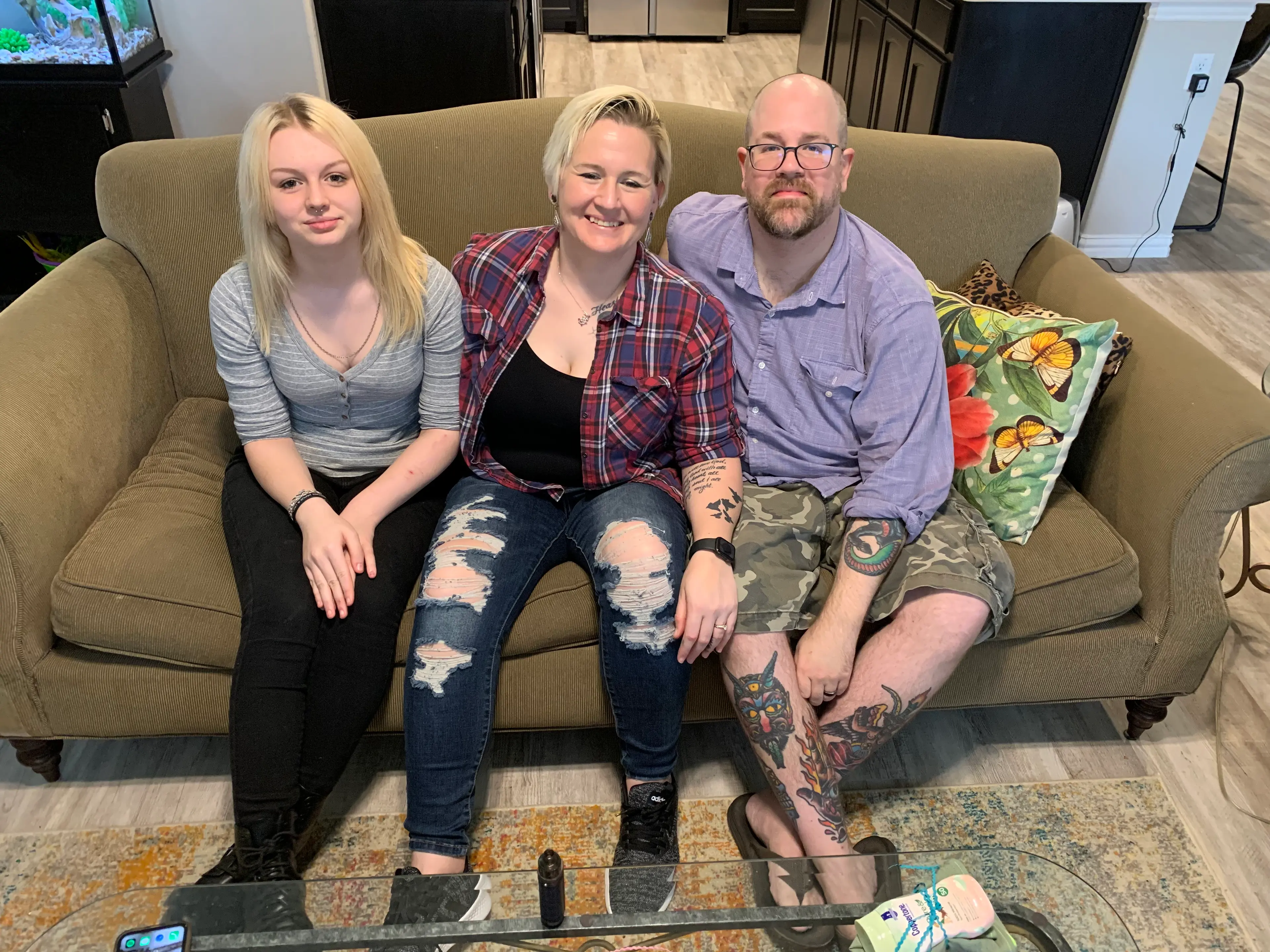 Sara Corcoran, center, and her daughter and husband