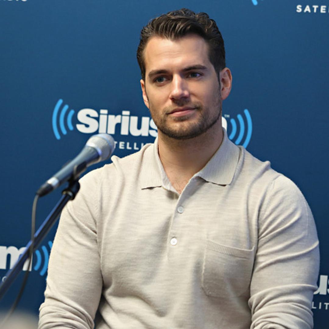 Actor Henry Cavill takes part in SiriusXM's Entertainment Weekly Radio 'The Man from U.N.C.L.E.' Town Hall with Guy Ritchie, Henry Cavill and Armie Hammer on August 12, 2015 in New York City.