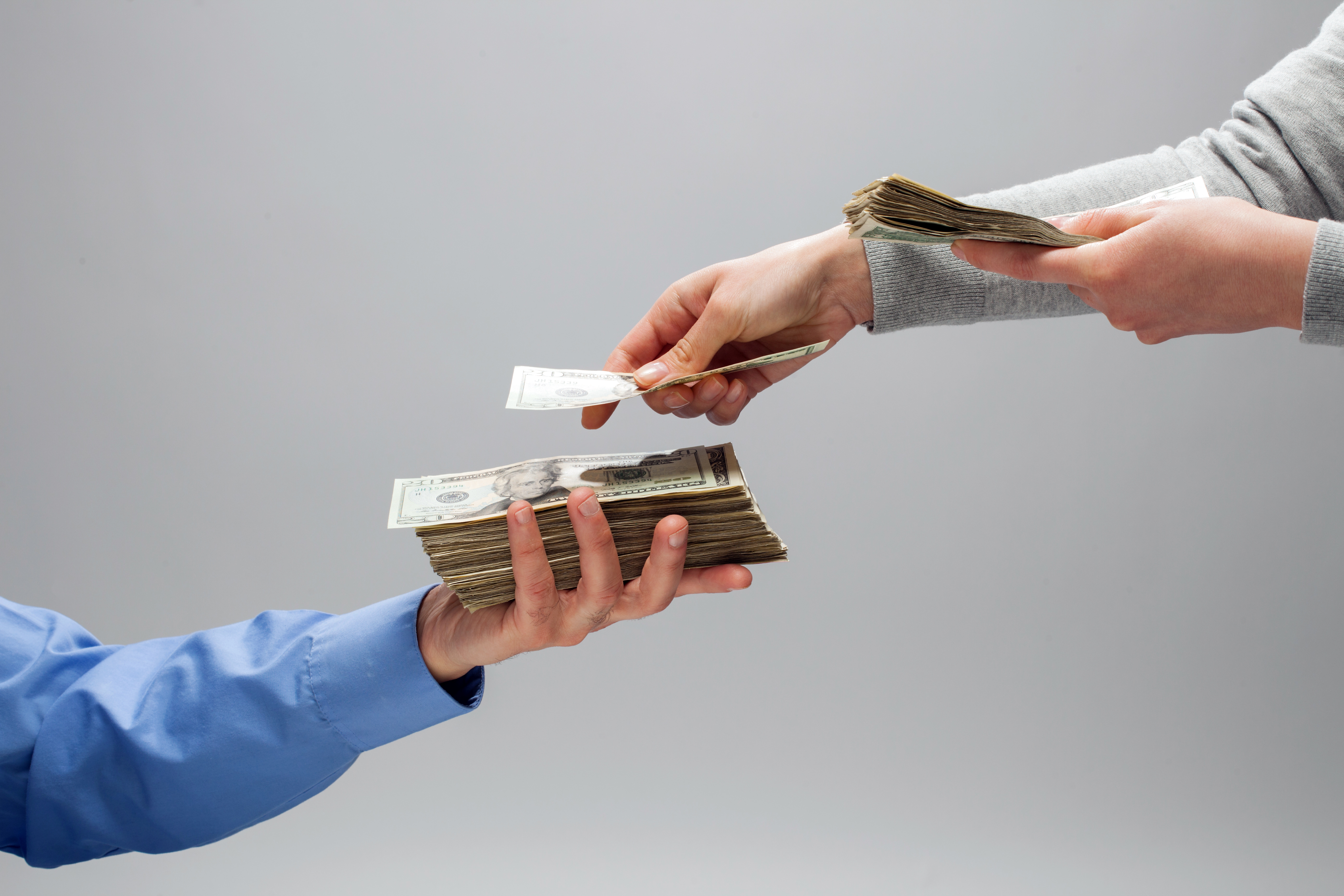 handing money over