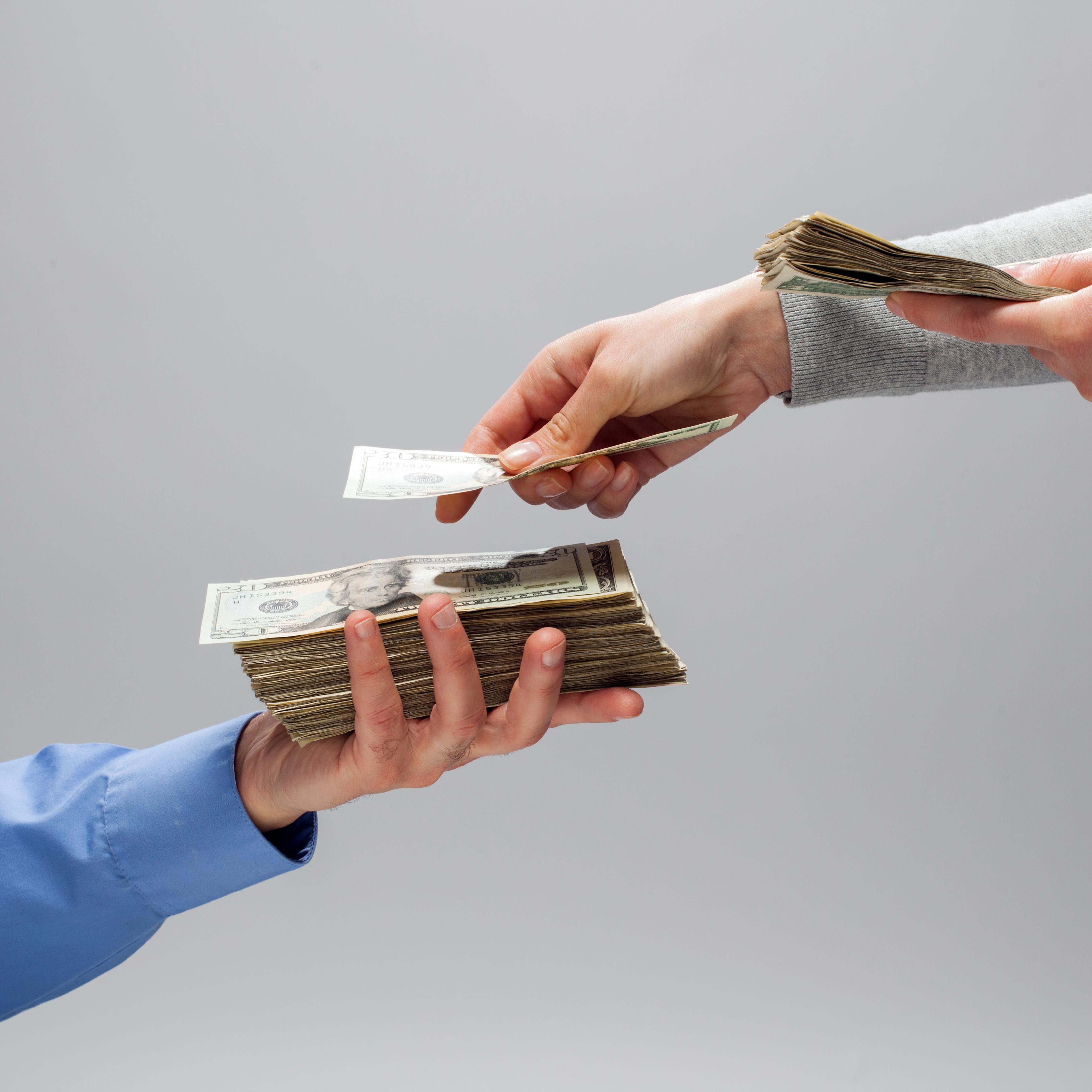 handing money over