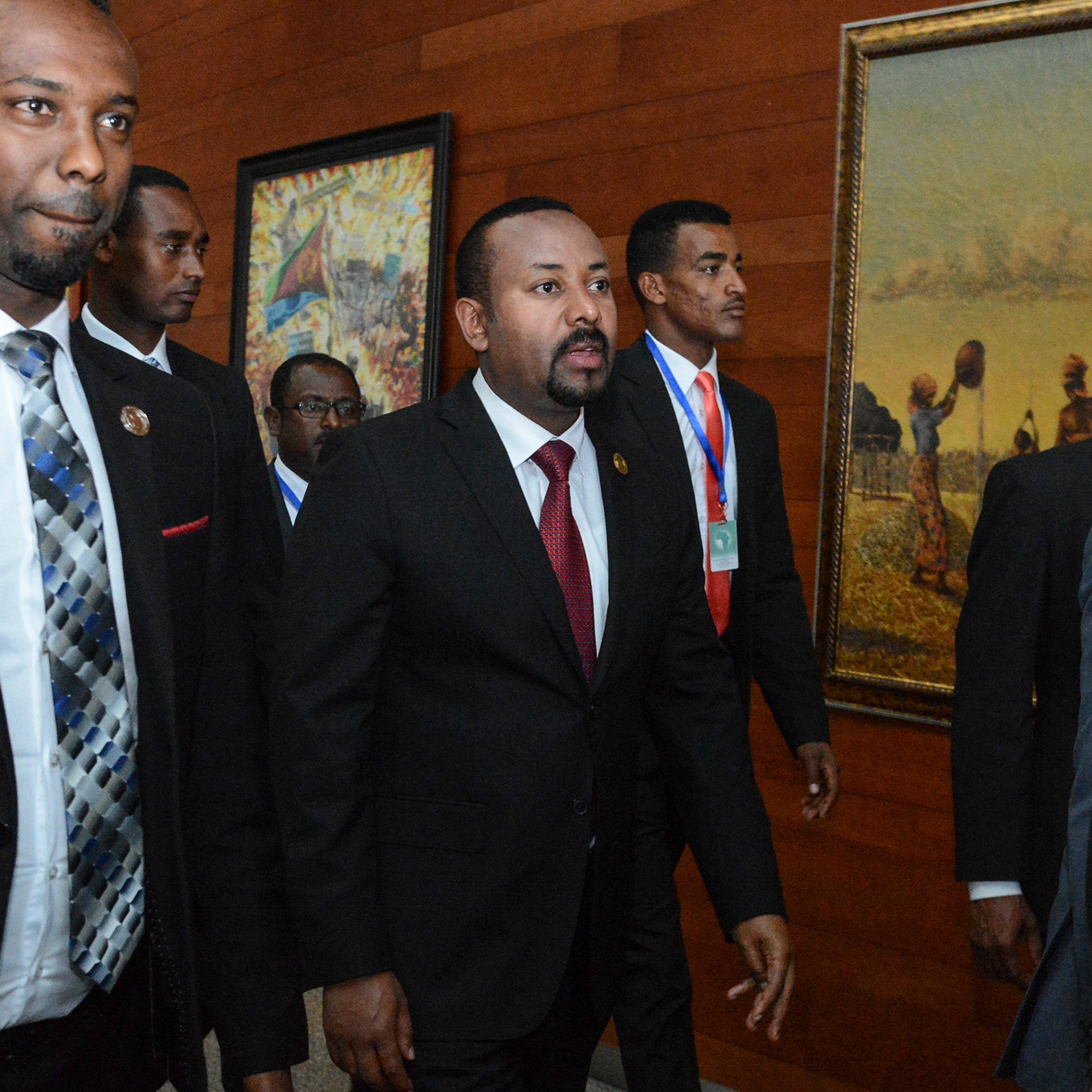 Ethiopia's Prime Minister Abiy Ahmed, center, arrives for the opening session of the 33rd African Union Summit in Addis Ababa on Feb. 9