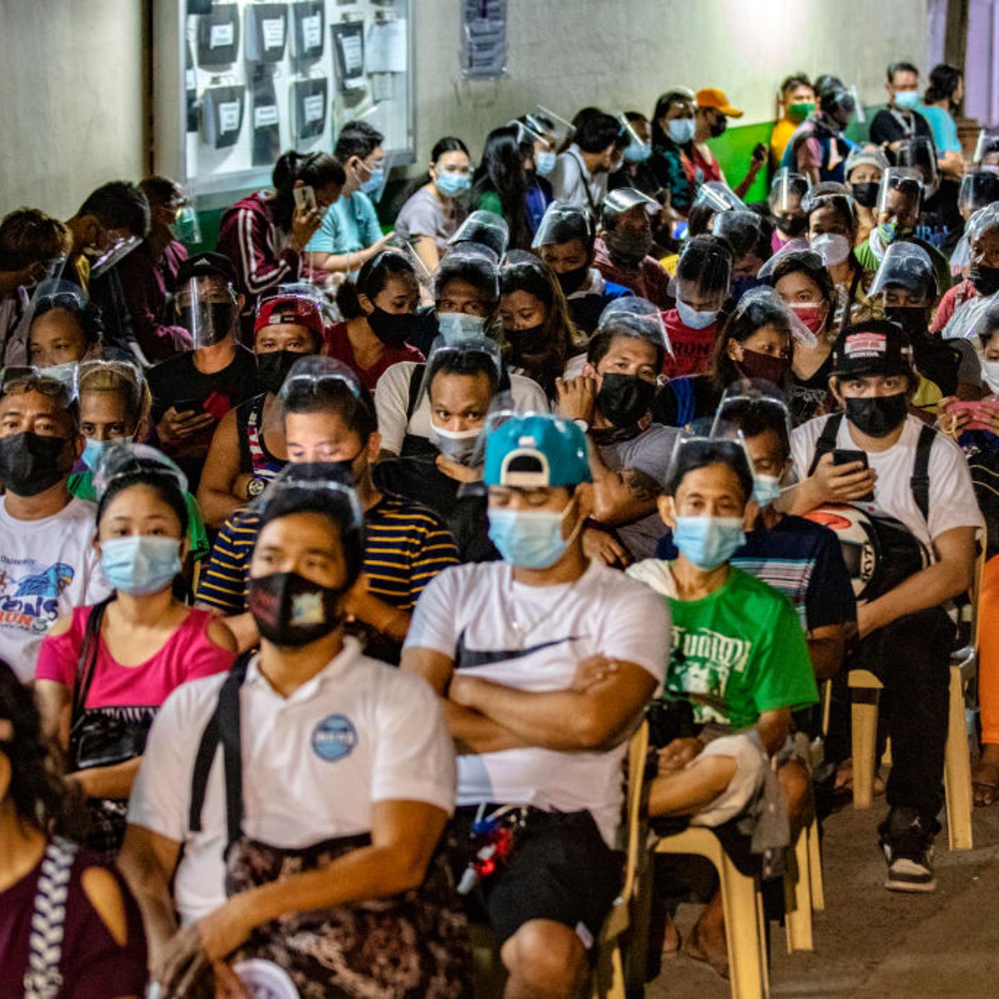 Filipinos Queue Overnight For Chance Of Getting First Vaccine Dose
