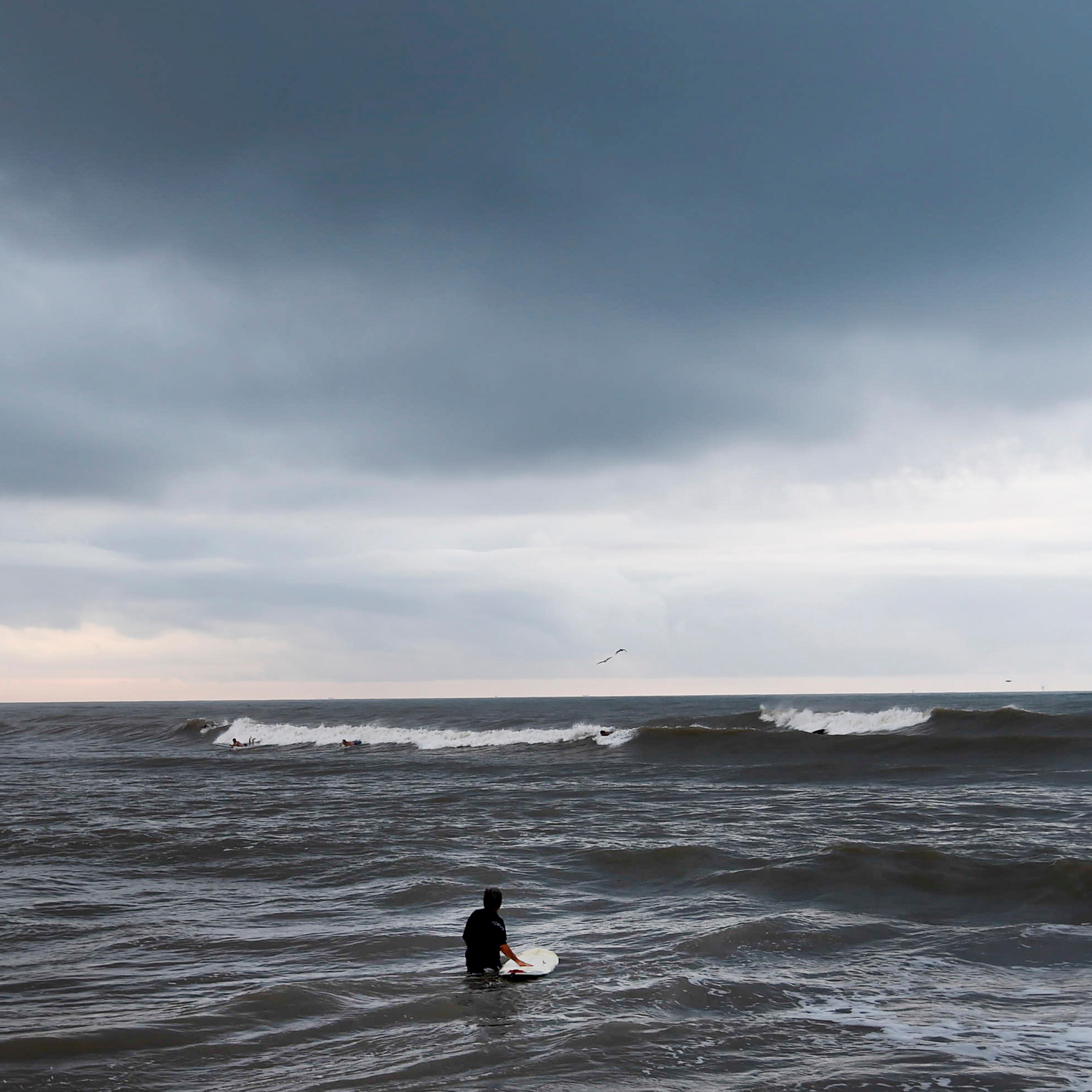 Dark clouds are seen over the ocean at J.P. Luby Park ahead of Hurricane Hanna, Friday, July 24, 2020, in Corpus Christi, Texas.