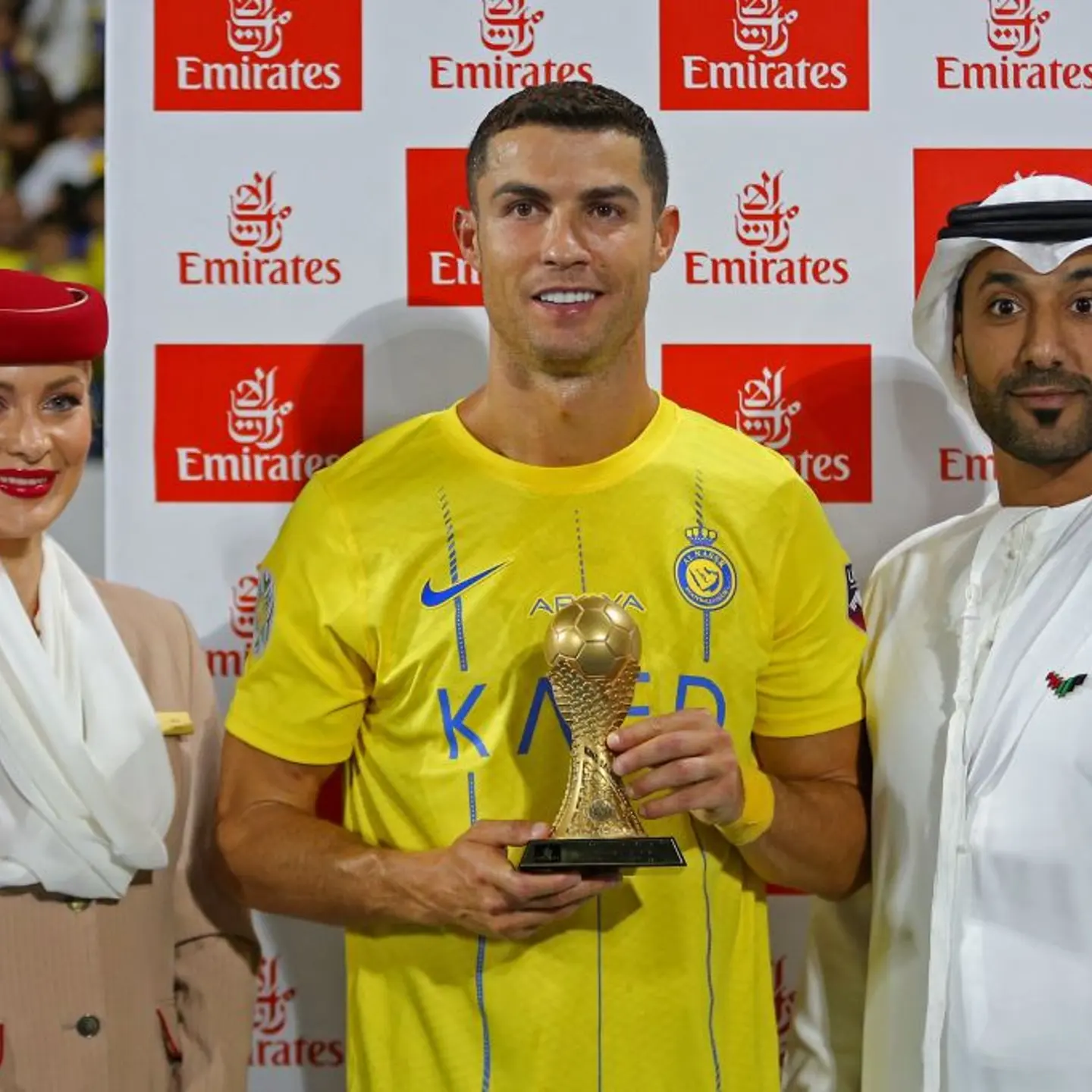Nassr's Portuguese forward Cristiano Ronaldo poses with his top scorer trophy following the 2023 Arab Club Champions Cup semi-final football match between Saudi Arabia's Al-Nassr and Iraq's Al-Shorta at Prince Sultan bin Abdul Aziz Stadium in Abha on Aug