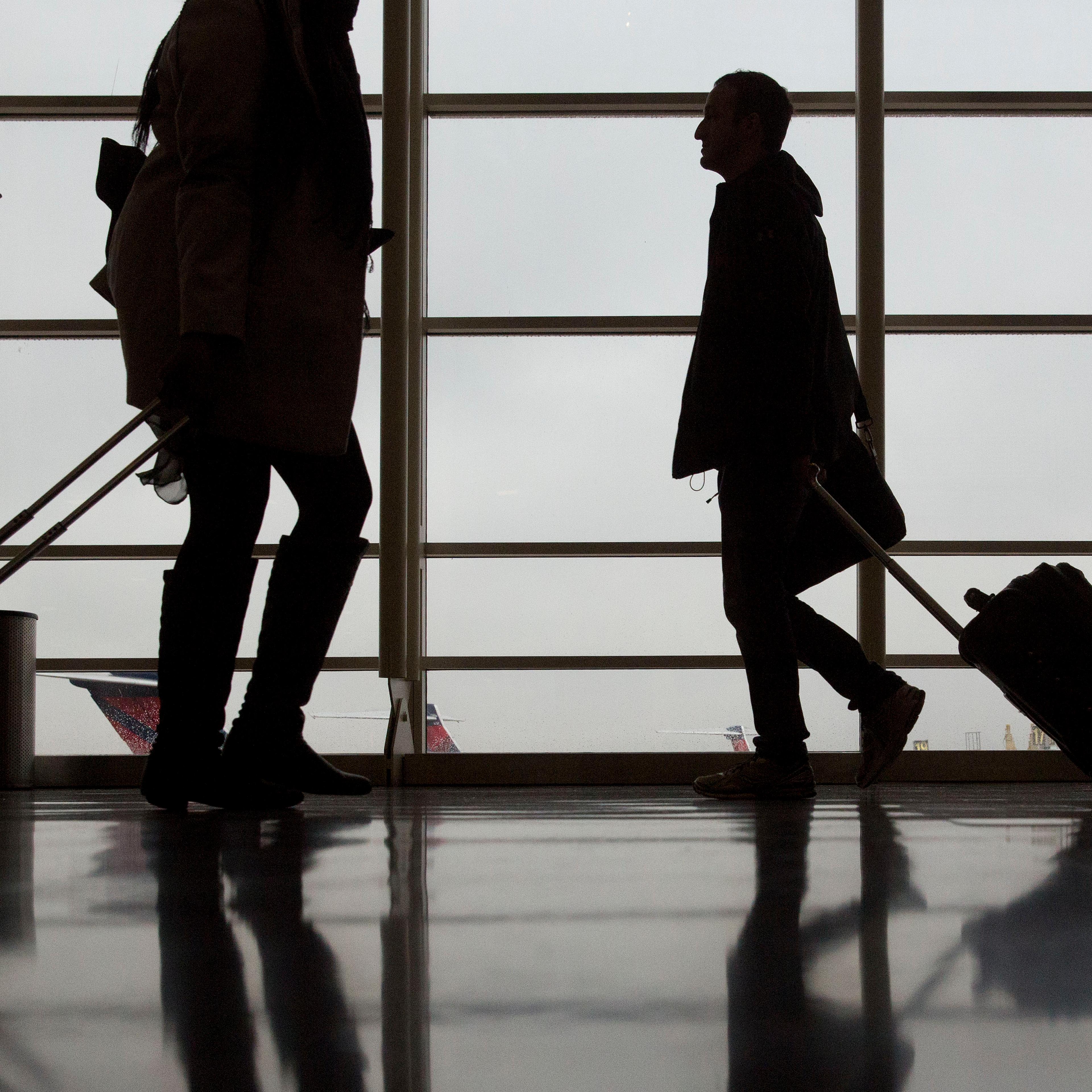 Inside Reagan National Airport As Winter Storm Cato Disrupts Thanksgiving Travel