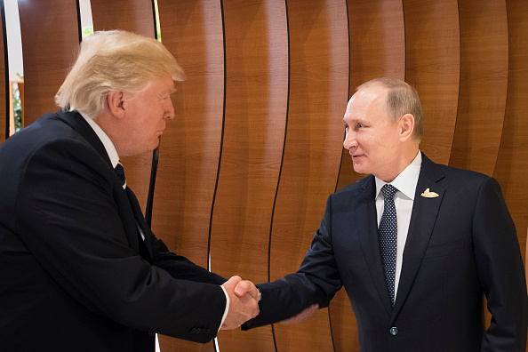 President Trump shakes hands with Russian President Vladimir Putin during the G20 meeting in Germany.