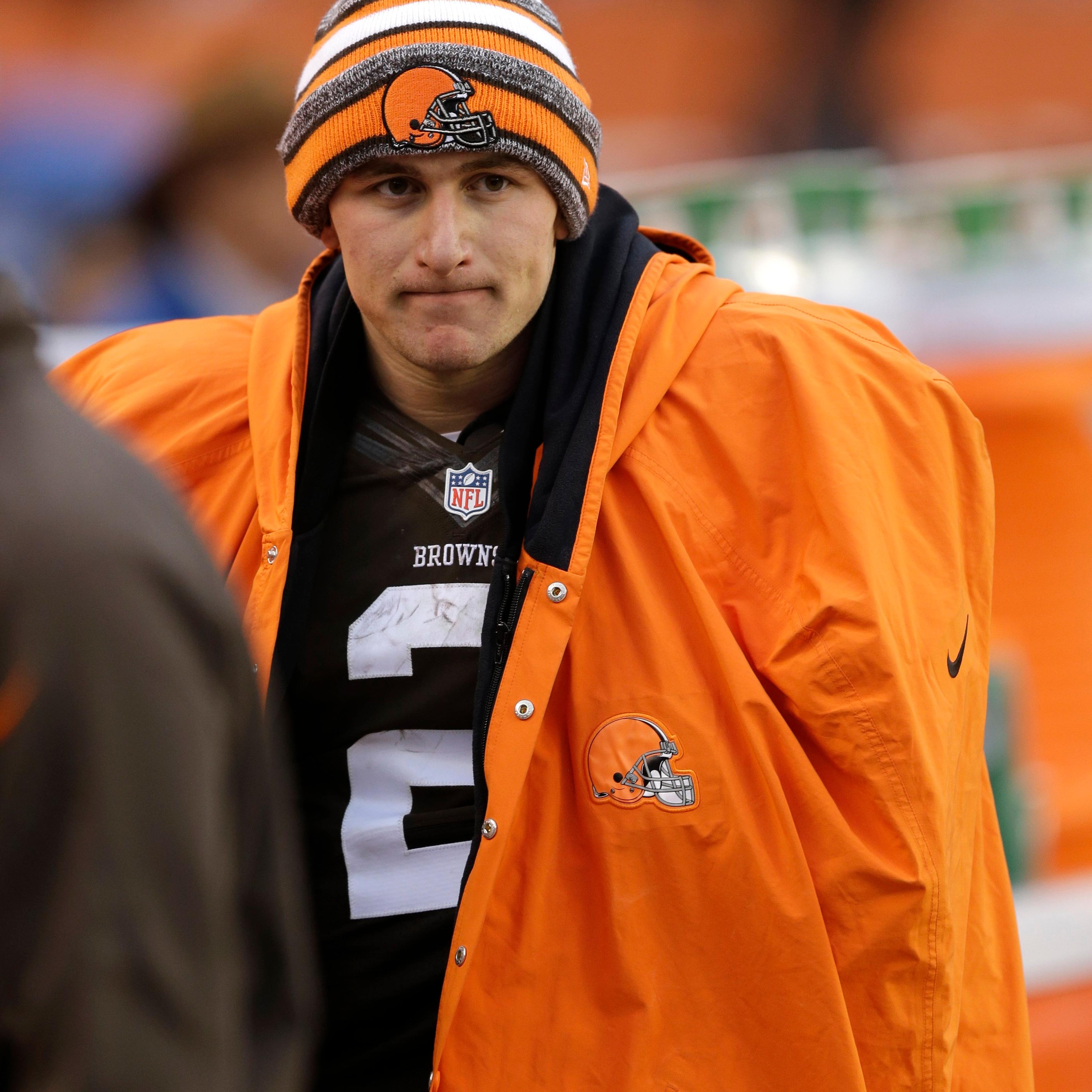 Cleveland Browns quarterback Johnny Manziel watches from the sidelines in the fourth quarter of an NFL football game against the Cincinnati Bengals in Cleveland on Dec. 14, 2014.