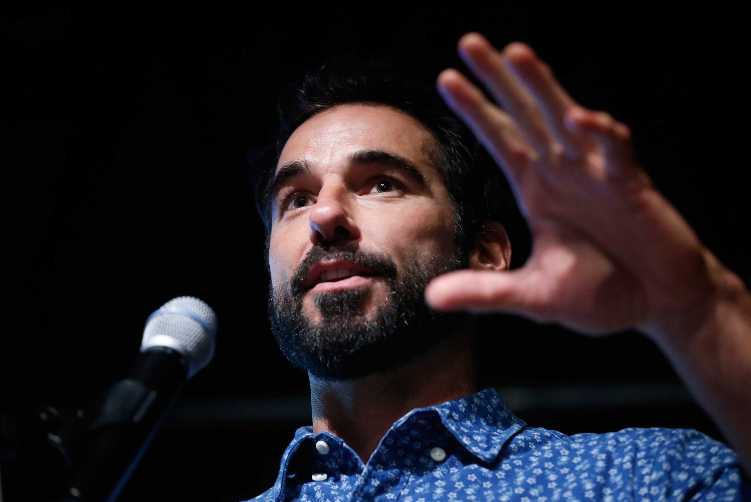 Former Denver Bronco Nate Jackson speaks during a cannabis industry expo in Denver, March 4, 2015.