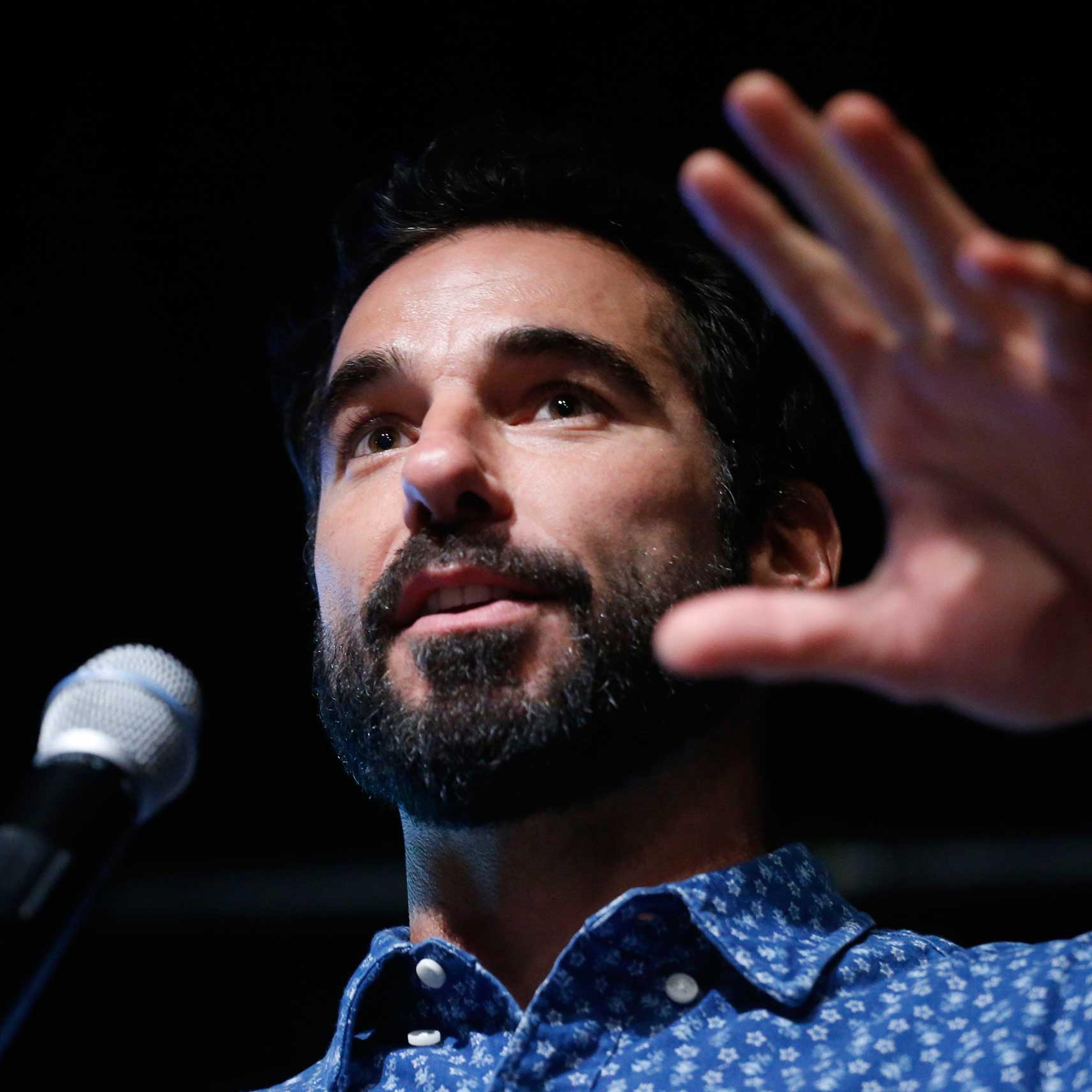 Former Denver Bronco Nate Jackson speaks during a cannabis industry expo in Denver, March 4, 2015.
