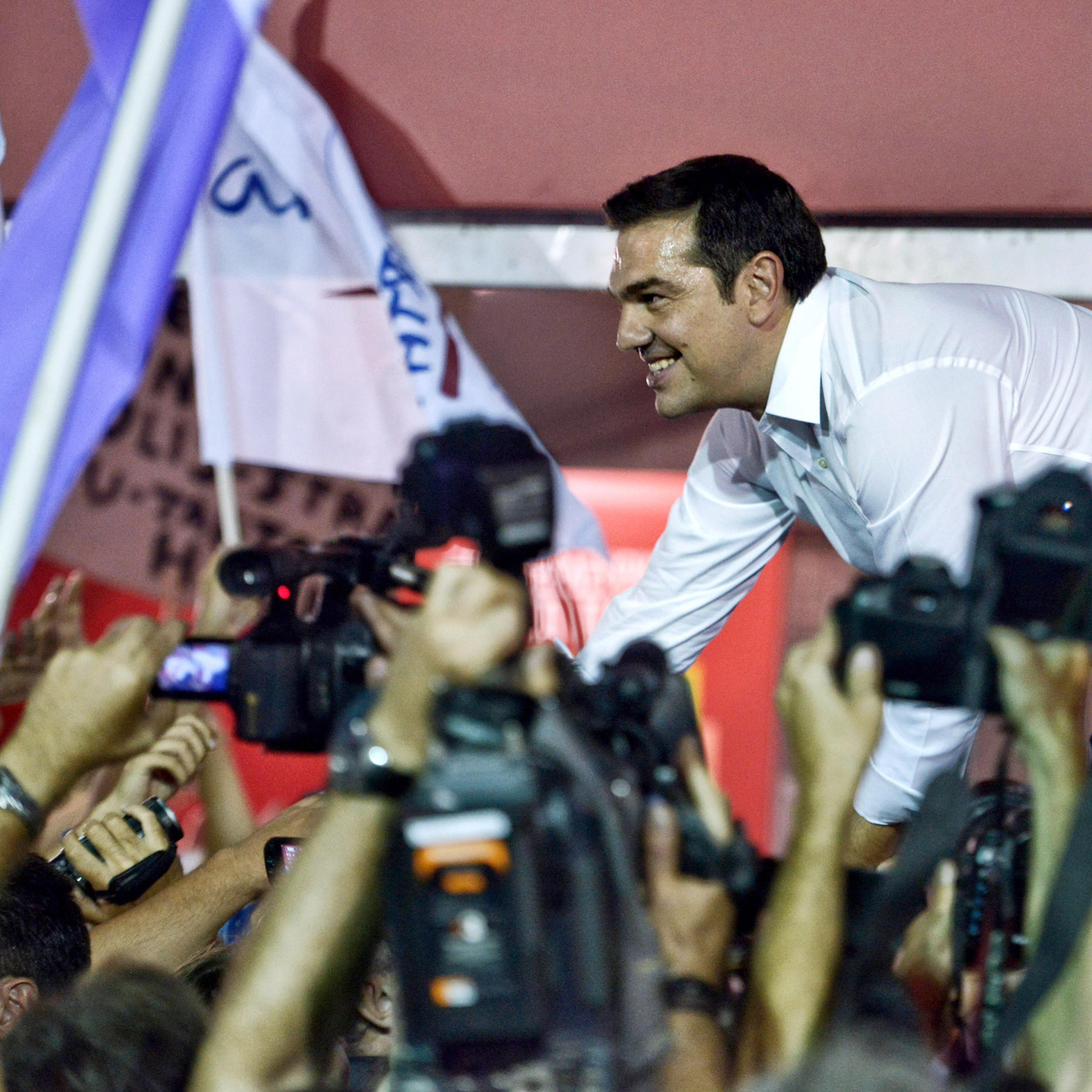 ATHENS, GREECE - SEPTEMBER 20: Former Greek prime minister and leader of leftist Syriza party Alexis Tsipras address supporters after winning the general election on September 20, 2015 in Athens, Greece. In Greece's fifth general election in six years, t