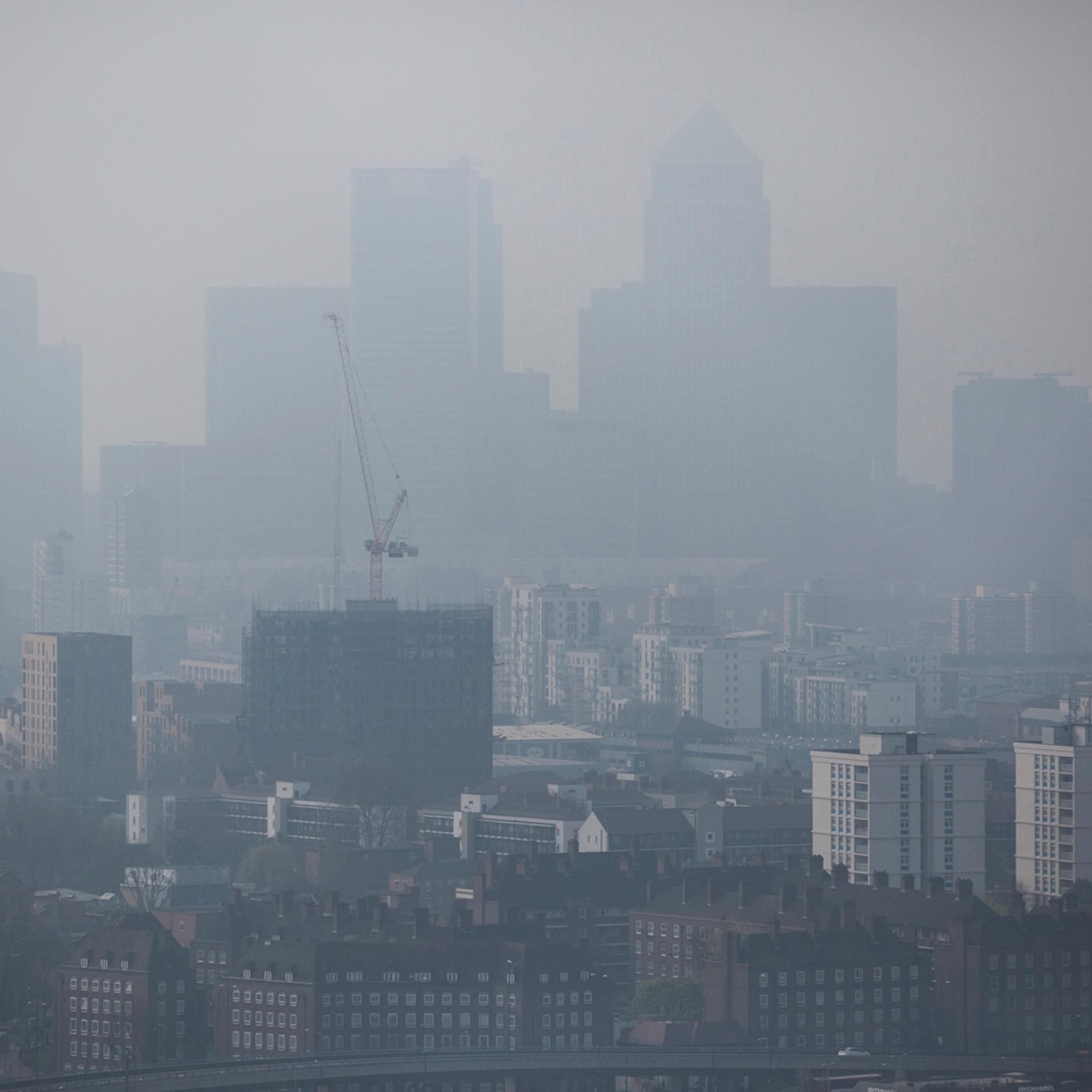 A general view through smog of the Canary Wharf financial district on April 2, 2014 in London.