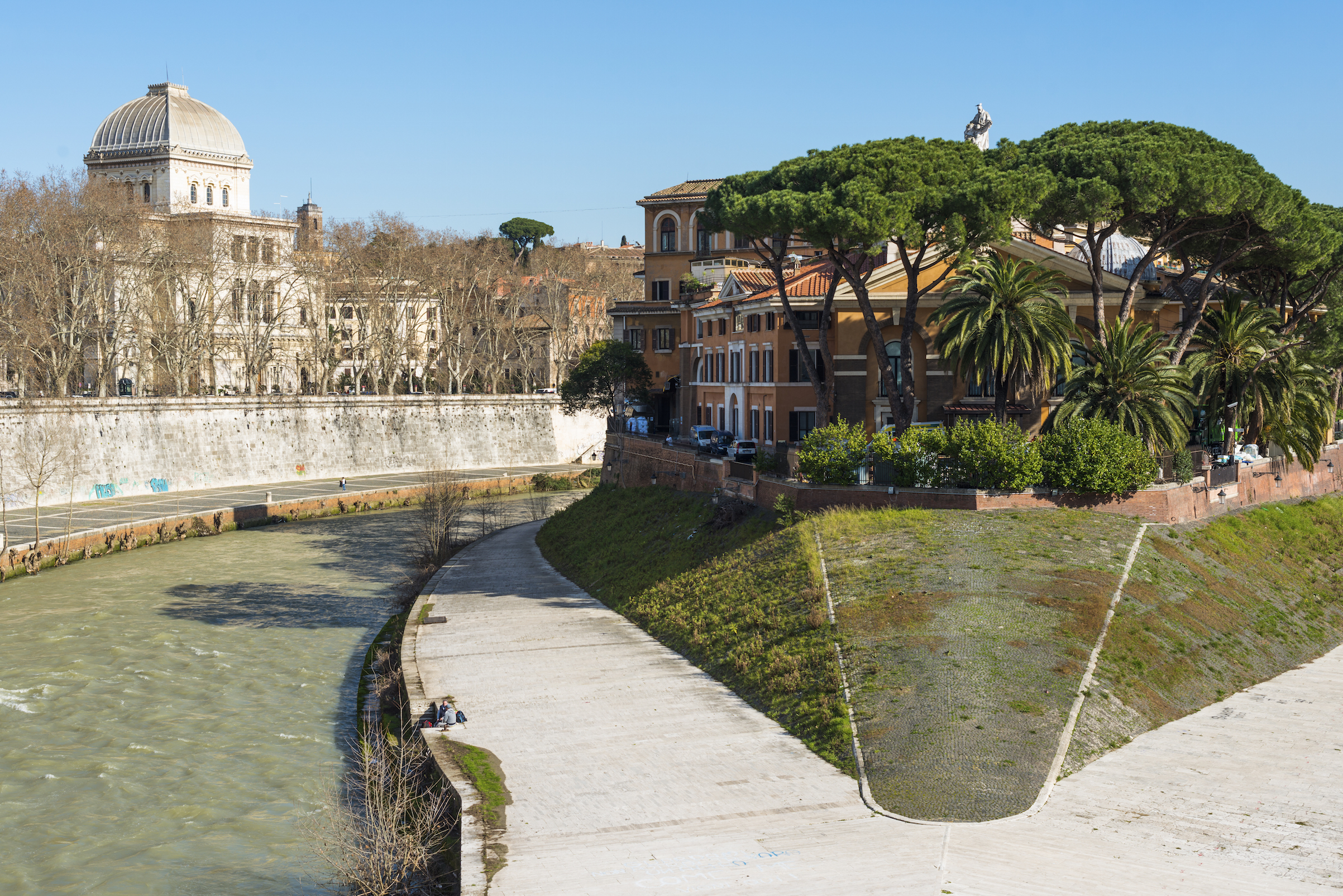 In the middle of Romes Tiber River is the small island Isola Tiberina Fatebenefratelli Hospital on western side Synagogue on left Lazio, Italy