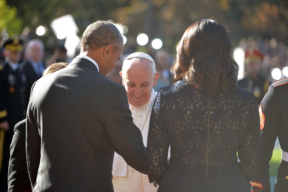 US President Barack Obama welcomes Pope Francis to the White House on September 23, 2015 in Washington,DC. President Barack Obama hosts Pope Francis at the White House for the first time Wednesday, warmly embracing the Catholic pontiff seen as both a mor