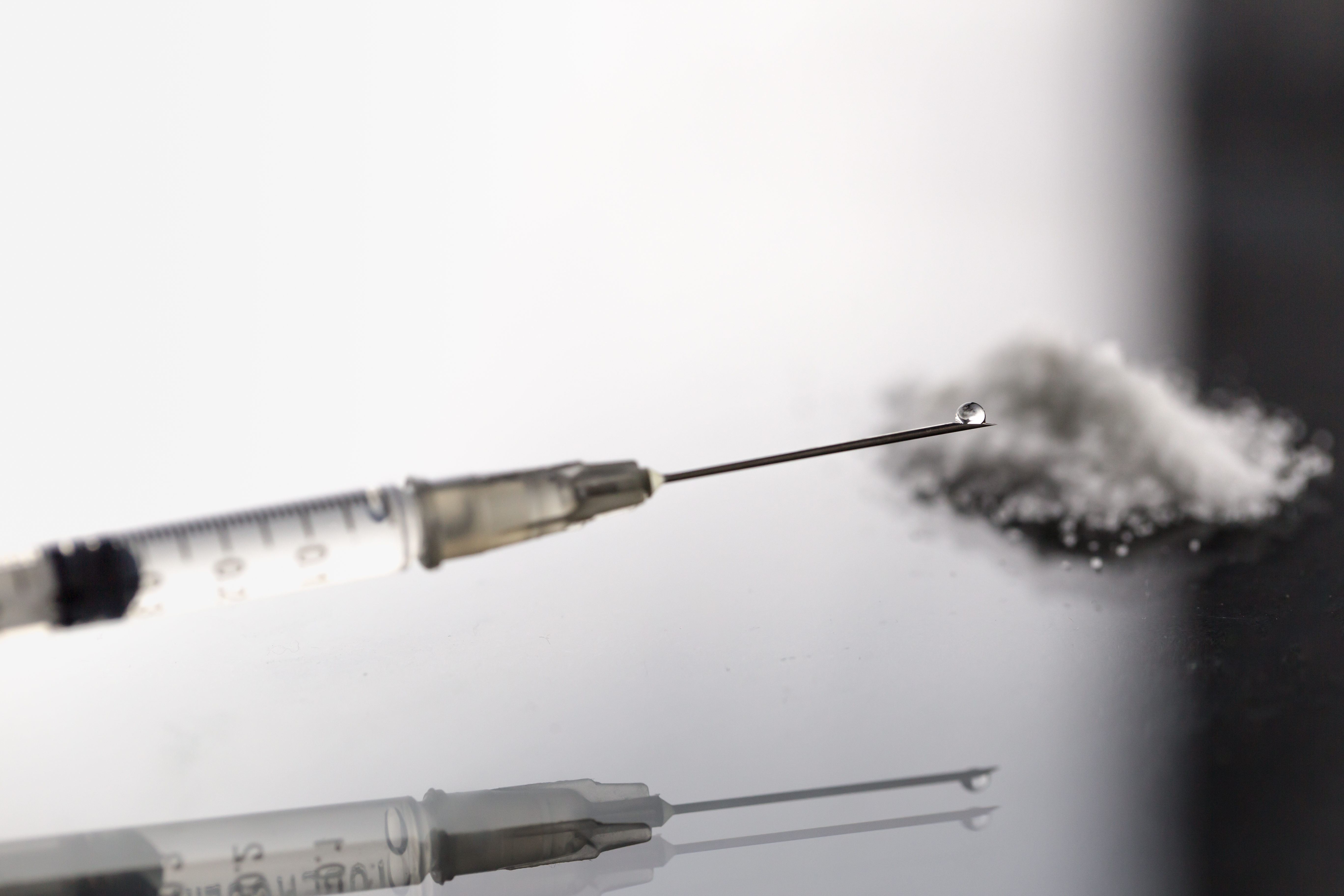 morphine or heroin drug liquid in syringe