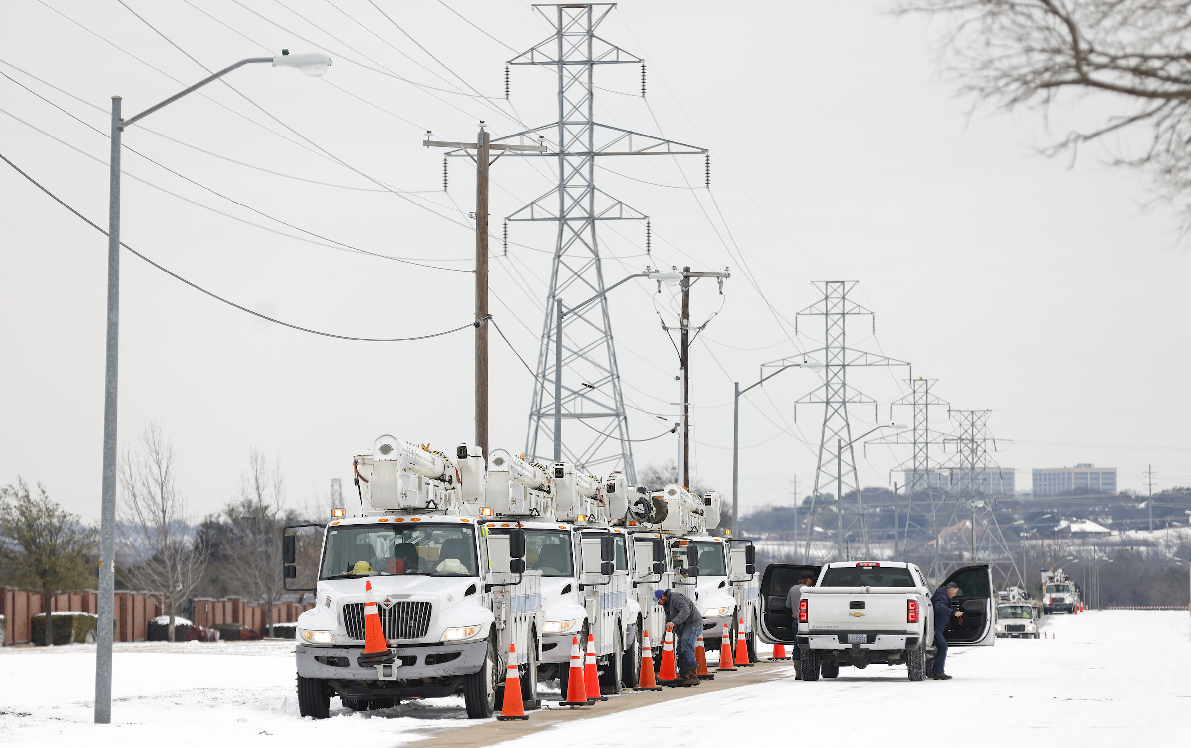 Pike Electric service trucks line up after a snow storm on February 16, 2021 in Fort Worth, Texas.