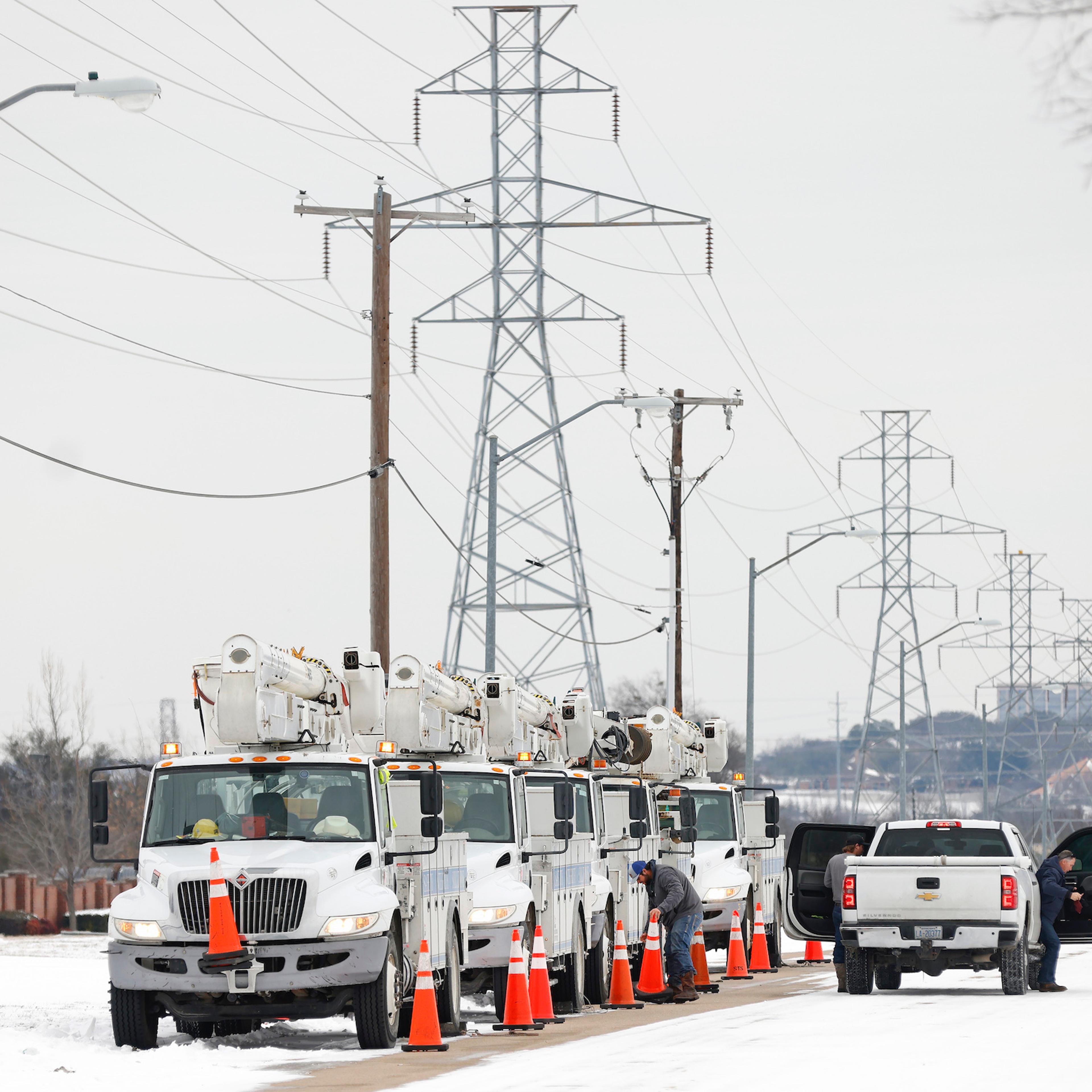 Pike Electric service trucks line up after a snow storm on February 16, 2021 in Fort Worth, Texas.