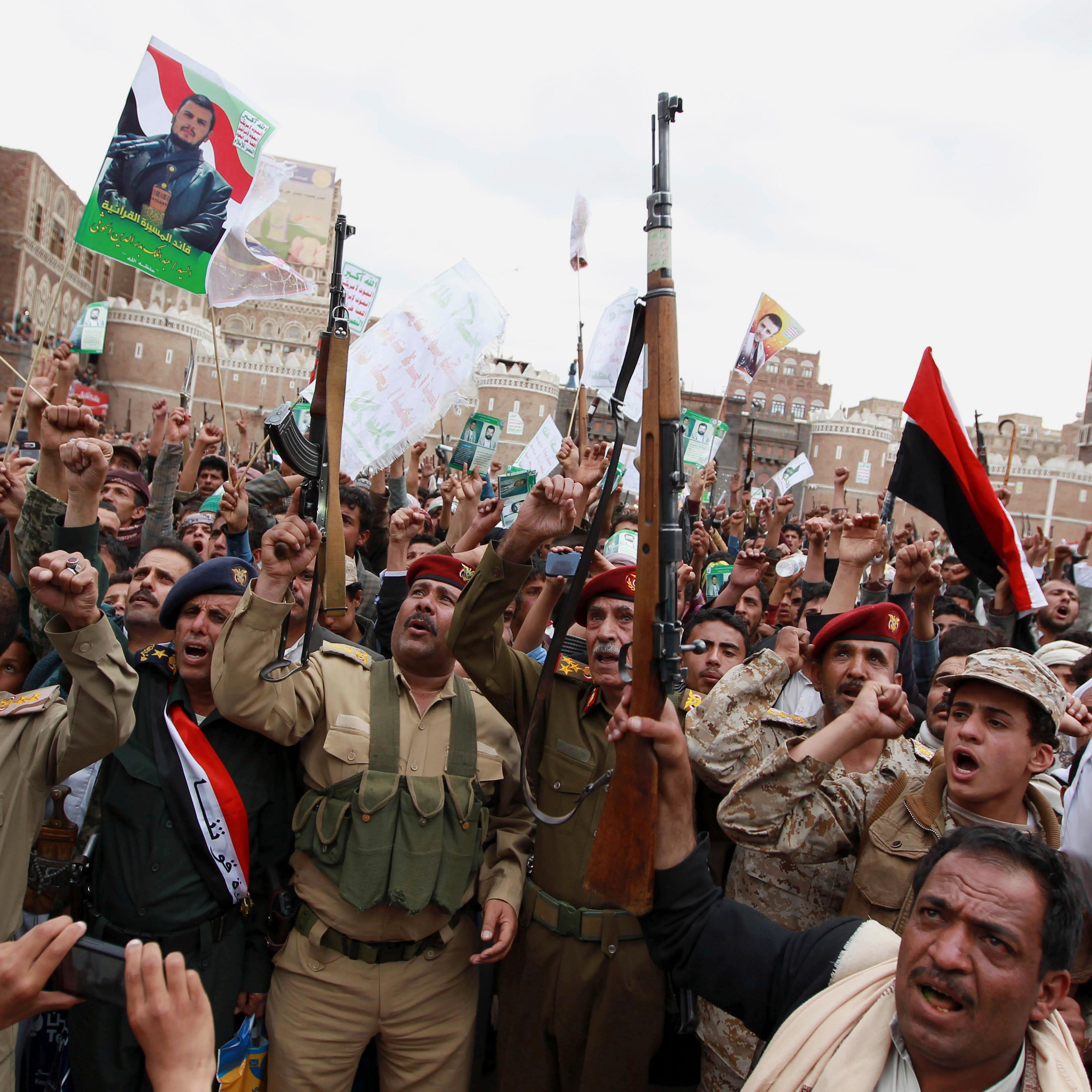 Shiite rebels, known as Houthis, gather to protest against Saudi-led airstrikes in Sanaa, Yemen, on March 26, 2015.
