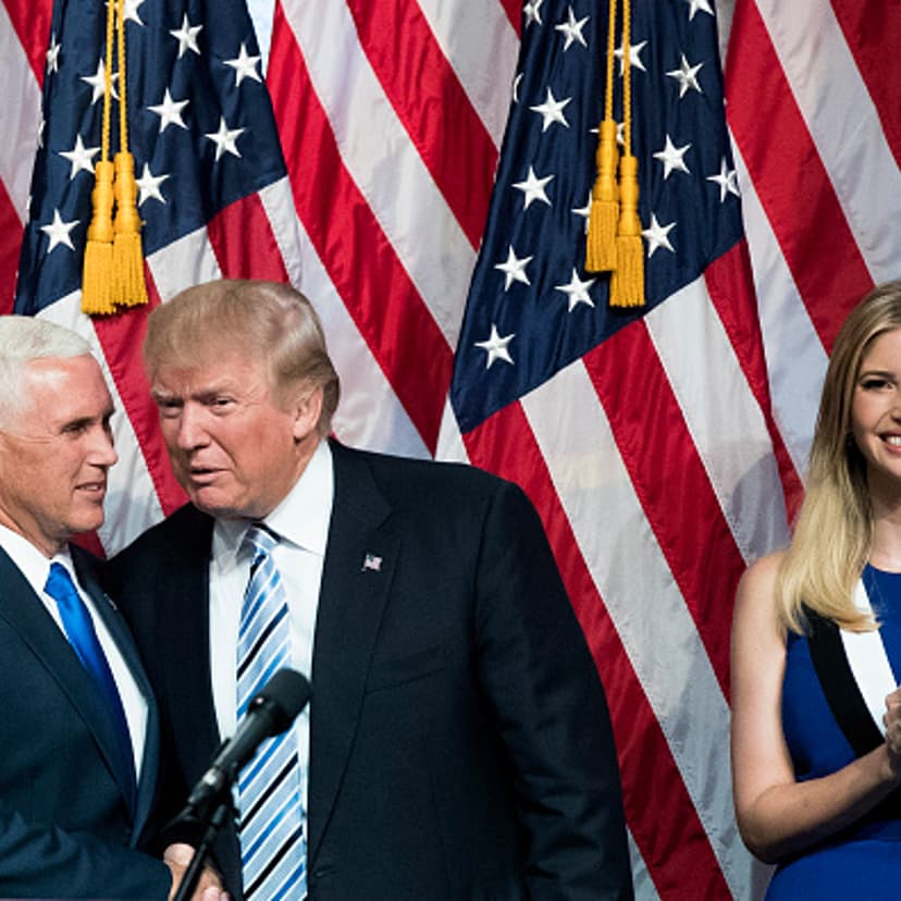 Newly selected vice presidential running mate Mike Pence, governor of Indiana, stands with Republican presidential candidate Donald Trump as Ivanka Trump looks on during an event at the Hilton Midtown Hotel, July 16, 2016 in New York City.