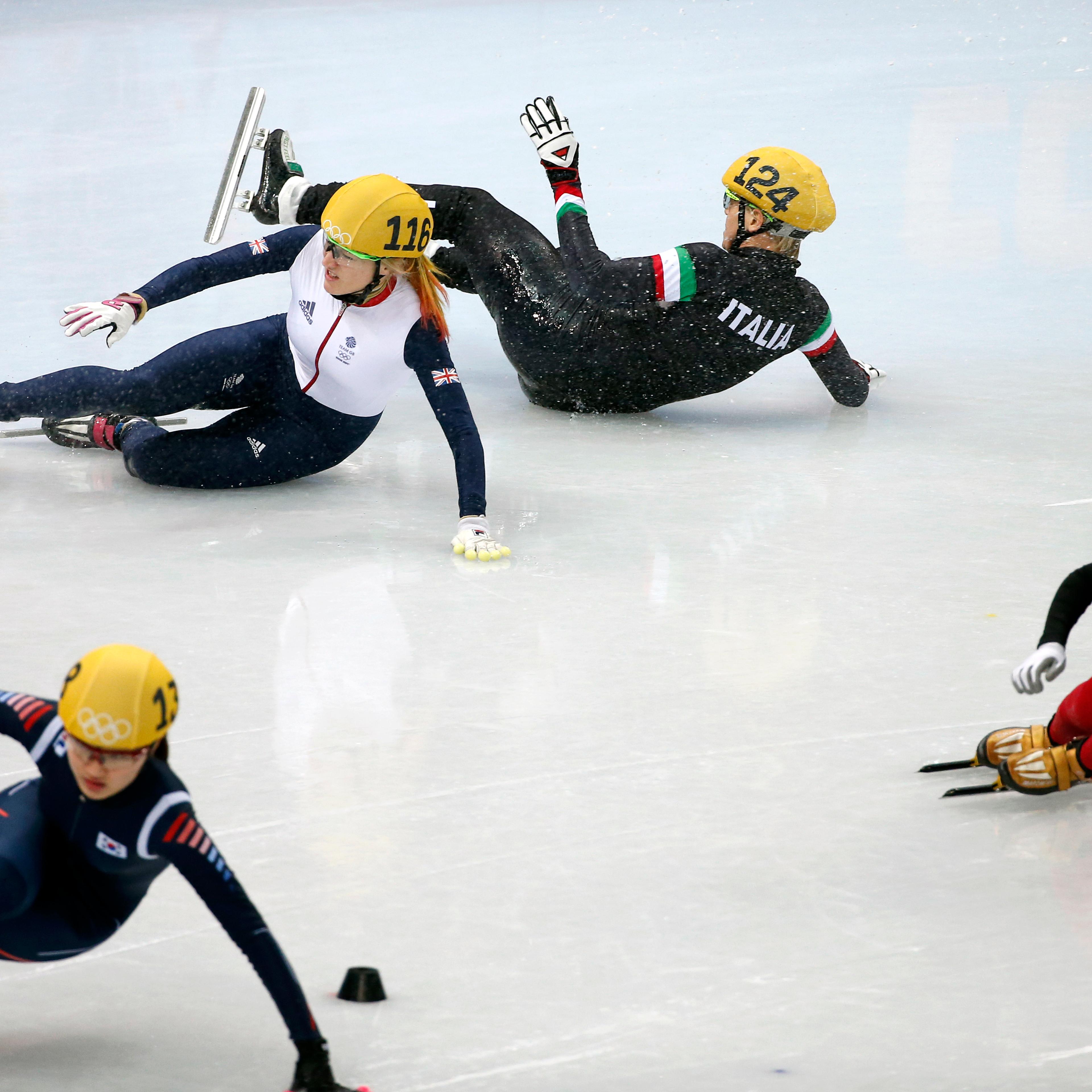 Elise Christie (rear left) of Great Britain and Arianna Fontana (rear right) of Italy collide in the women's 500m final of the Short Track events.