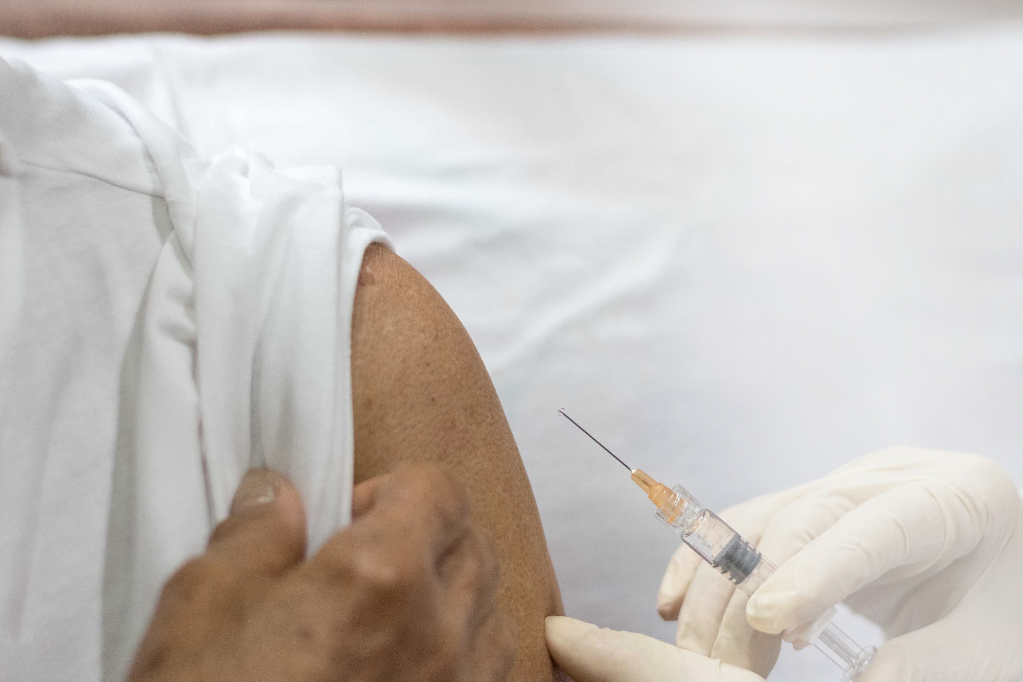 Adult getting a measles shot