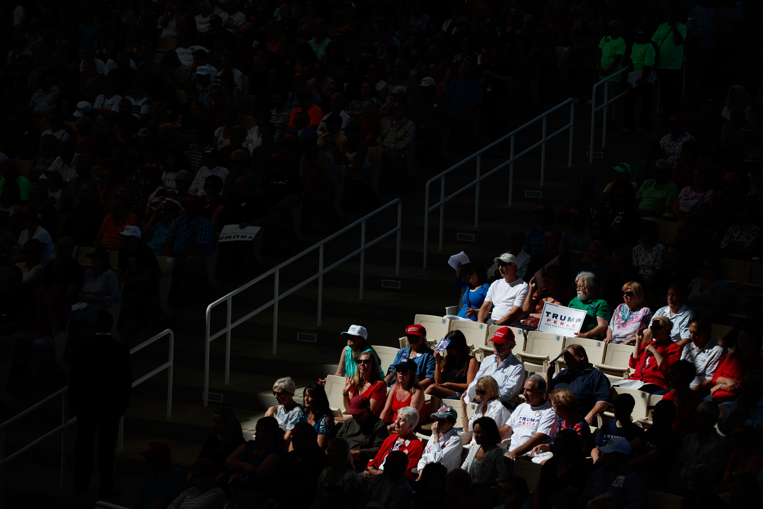 Supporters of Republican presidential candidate Donald Trump listen to him speak during a campaign rally, Wednesday, Oct. 5, 2016, in Henderson, Nev. (AP Photo/ Evan Vucci)