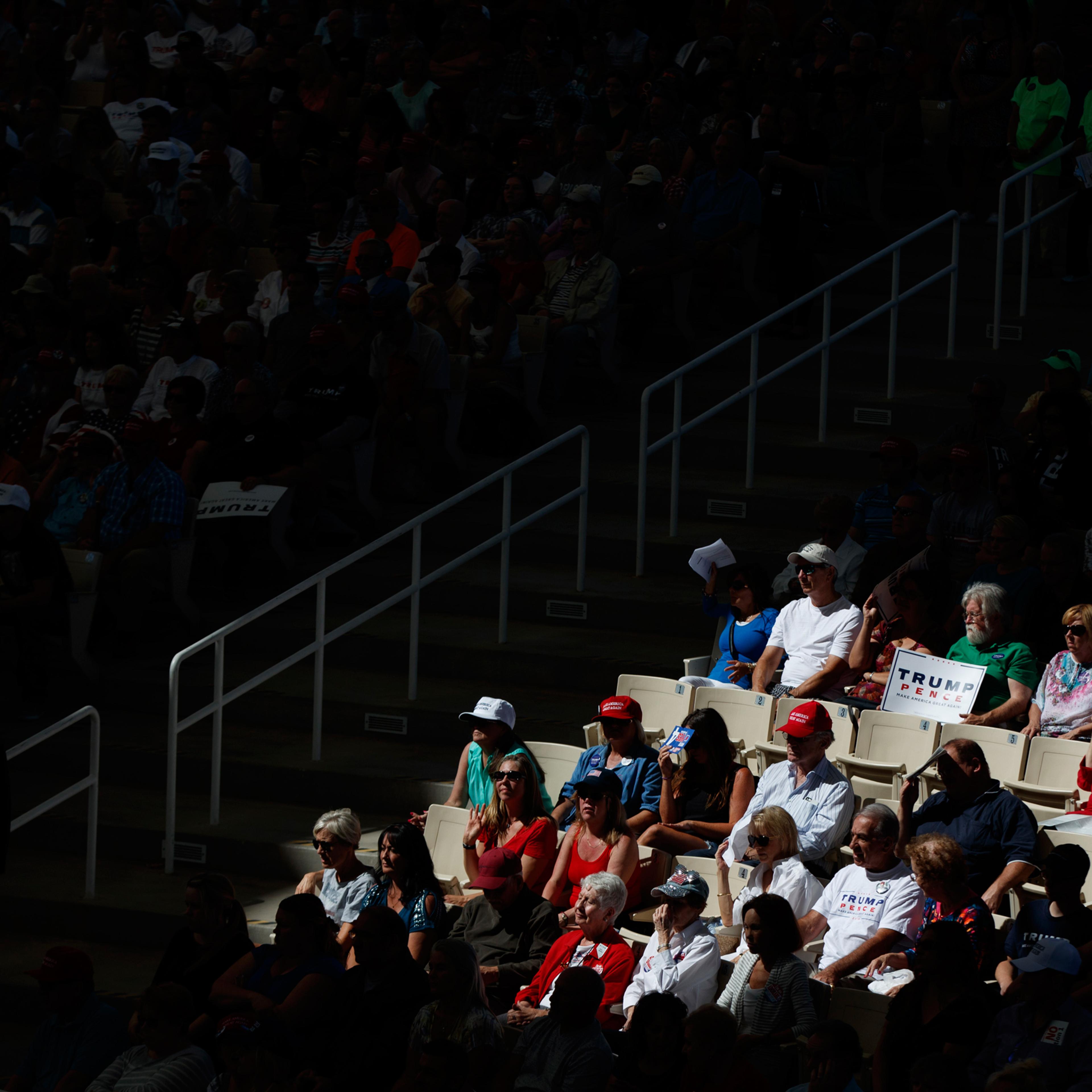 Supporters of Republican presidential candidate Donald Trump listen to him speak during a campaign rally, Wednesday, Oct. 5, 2016, in Henderson, Nev. (AP Photo/ Evan Vucci)
