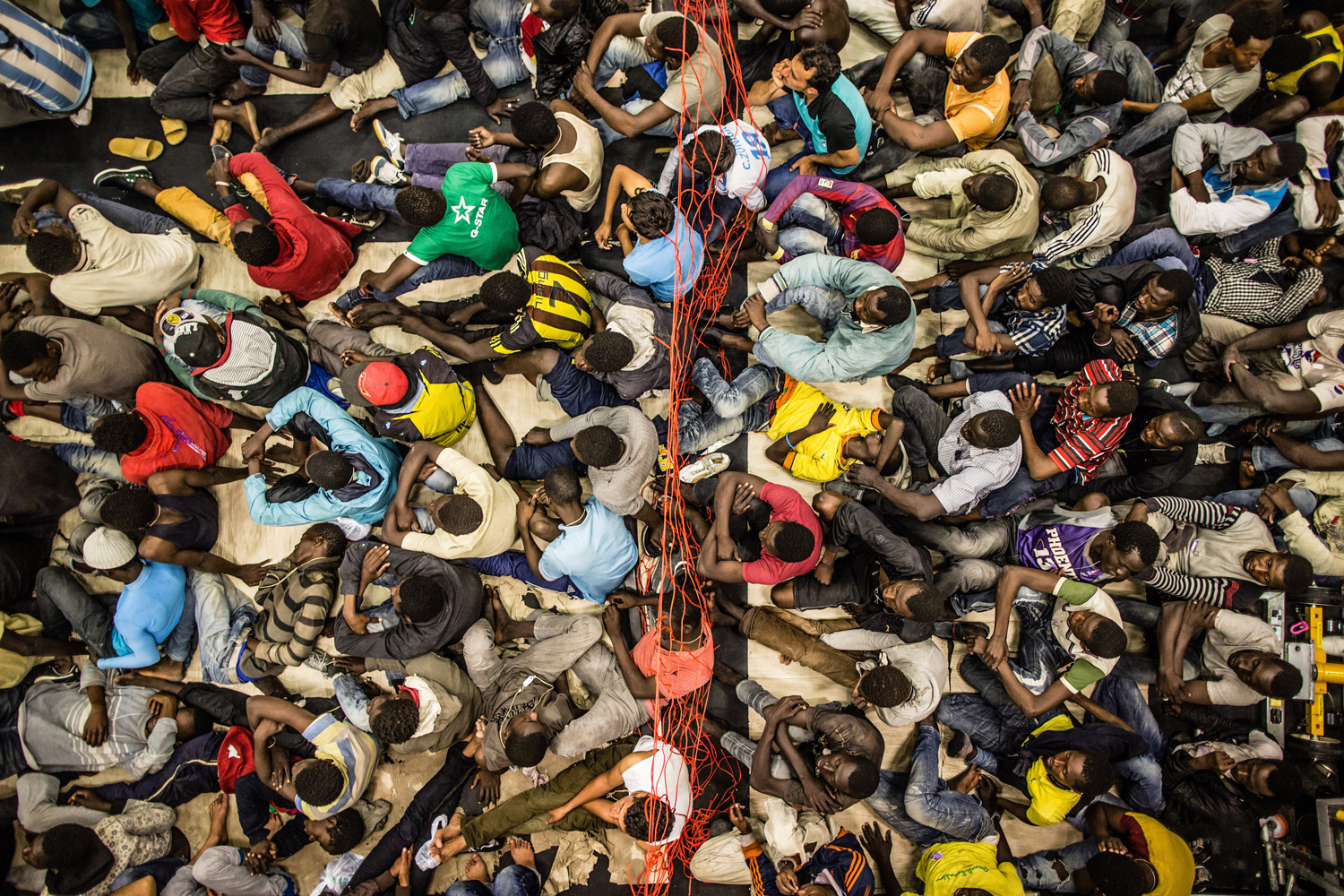 African asylum seekers on board a rescue craft dispatched from an Italian navy ship, June