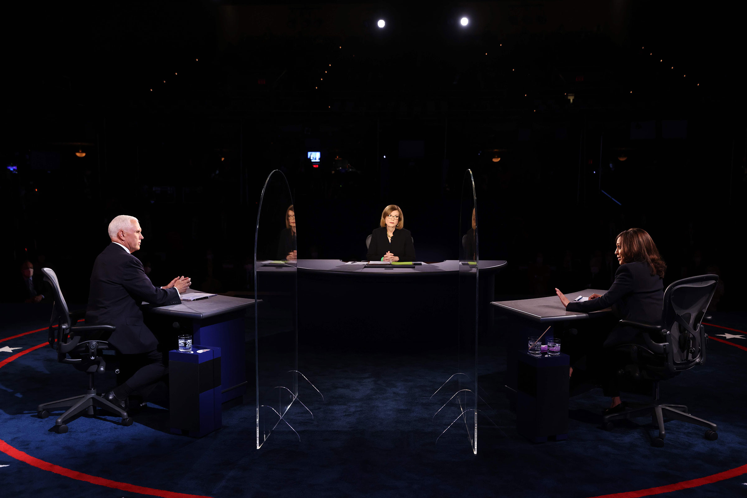 Vice President Mike and Pence Democratic vice presidential nominee and Senator Kamala Harris and moderator Washington Bureau Chief for USA Today Susan Page participate in the vice presidential debate on Oct. 7, 2020 in Salt Lake City, Utah.
