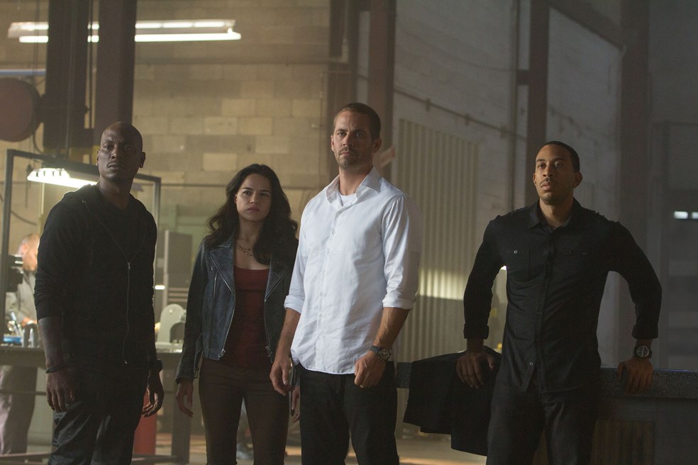 (L-R) Tyrese Gibson, Jordana Brewster, Paul Walker, and Ludacris in FURIOUS 7.