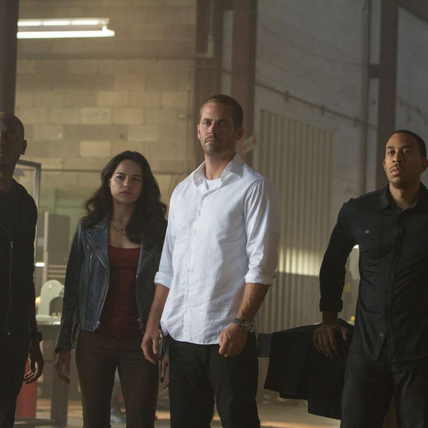 (L-R) Tyrese Gibson, Jordana Brewster, Paul Walker, and Ludacris in FURIOUS 7.
