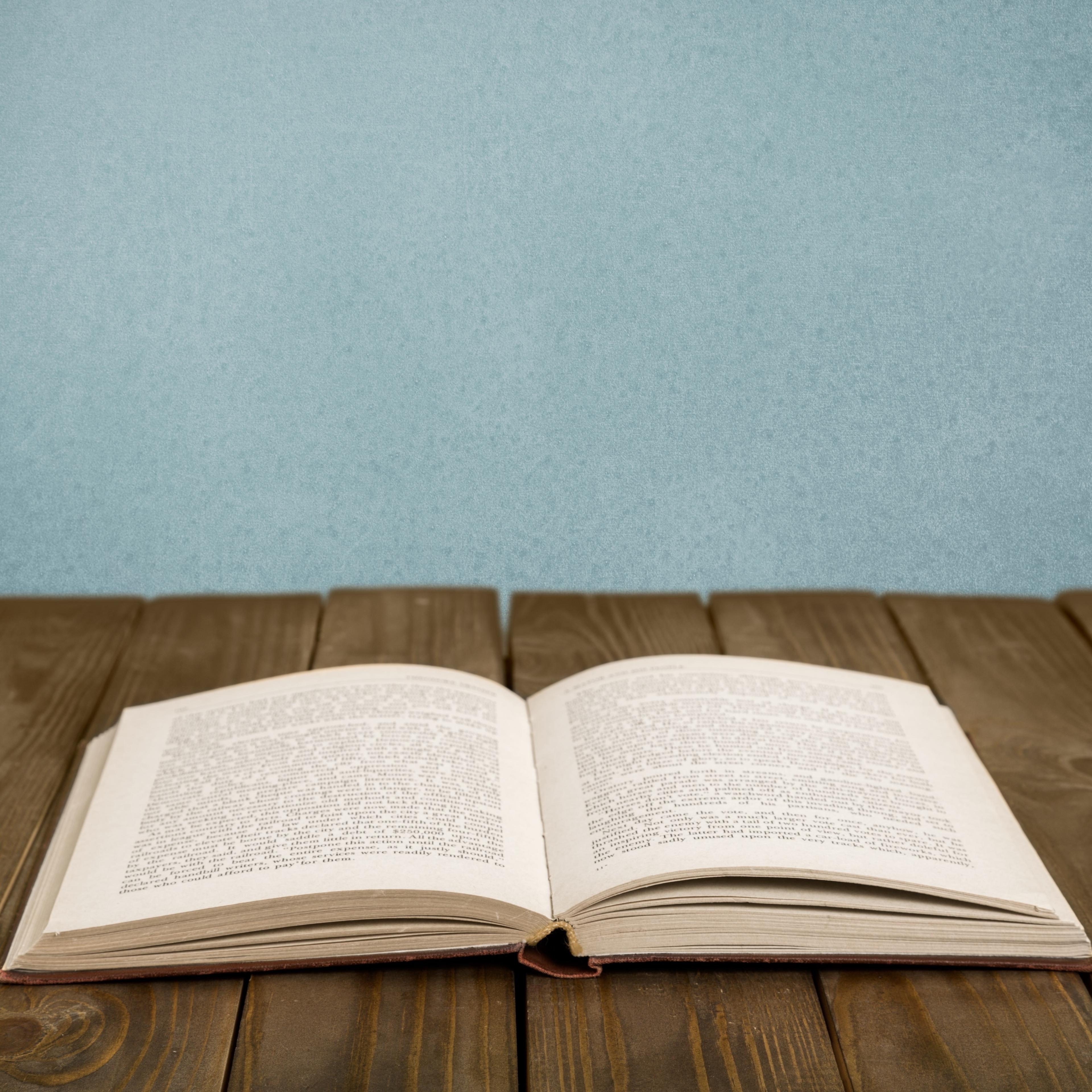 open-book-wooden-table