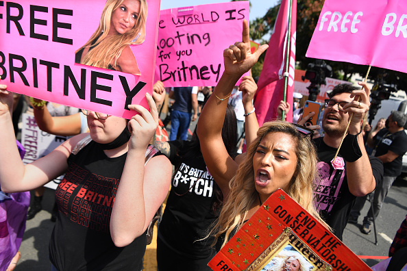 Britney Spears fans rally outside the courthouse before the announcement that Britney Spears' father, Jamie Spears, is suspended from her conservatorship in Los Angeles on Sept. 29, 2021.