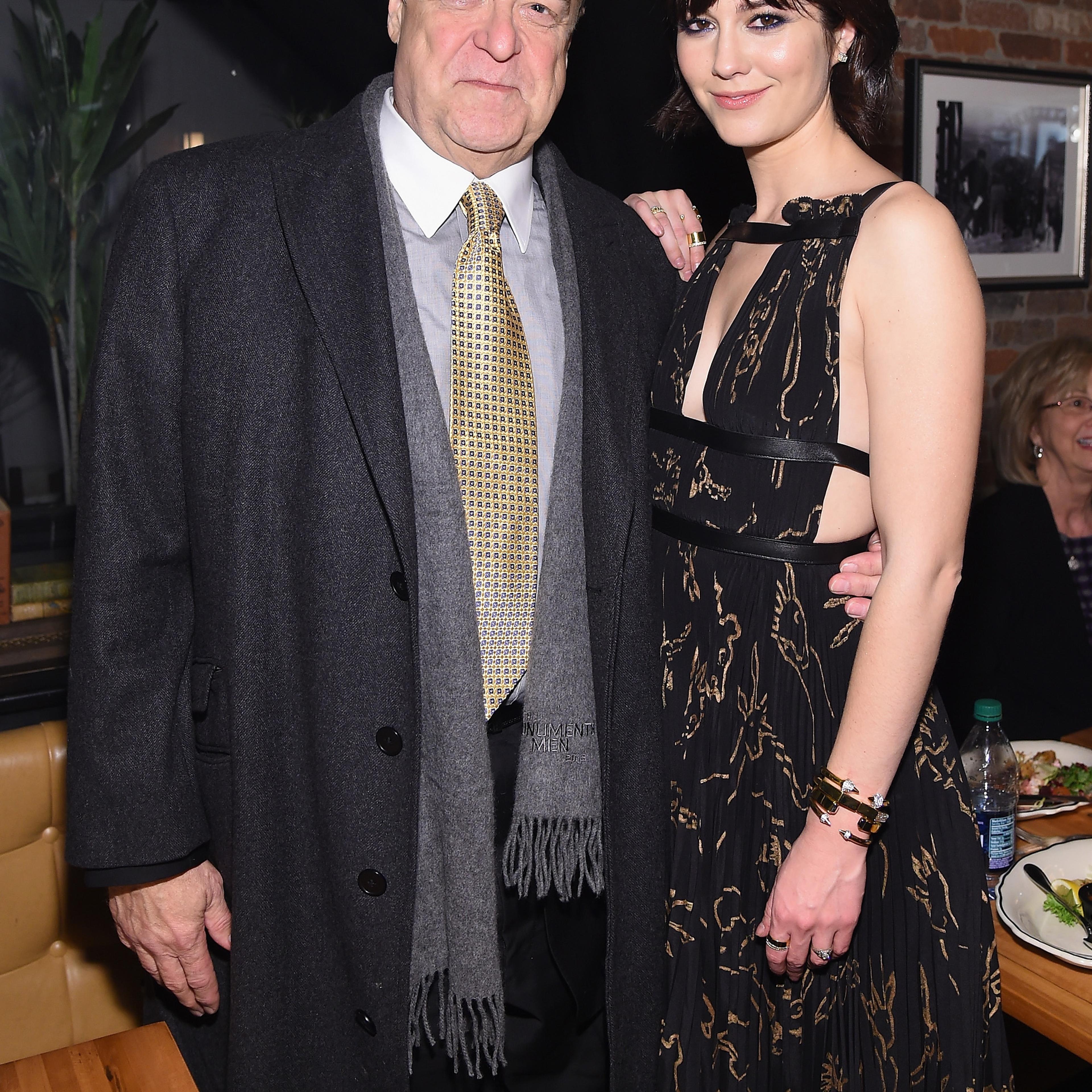 John Goodman and Mary Elizabeth Winstead after the "10 Cloverfield Lane" New York Premiere on March 8, 2016.