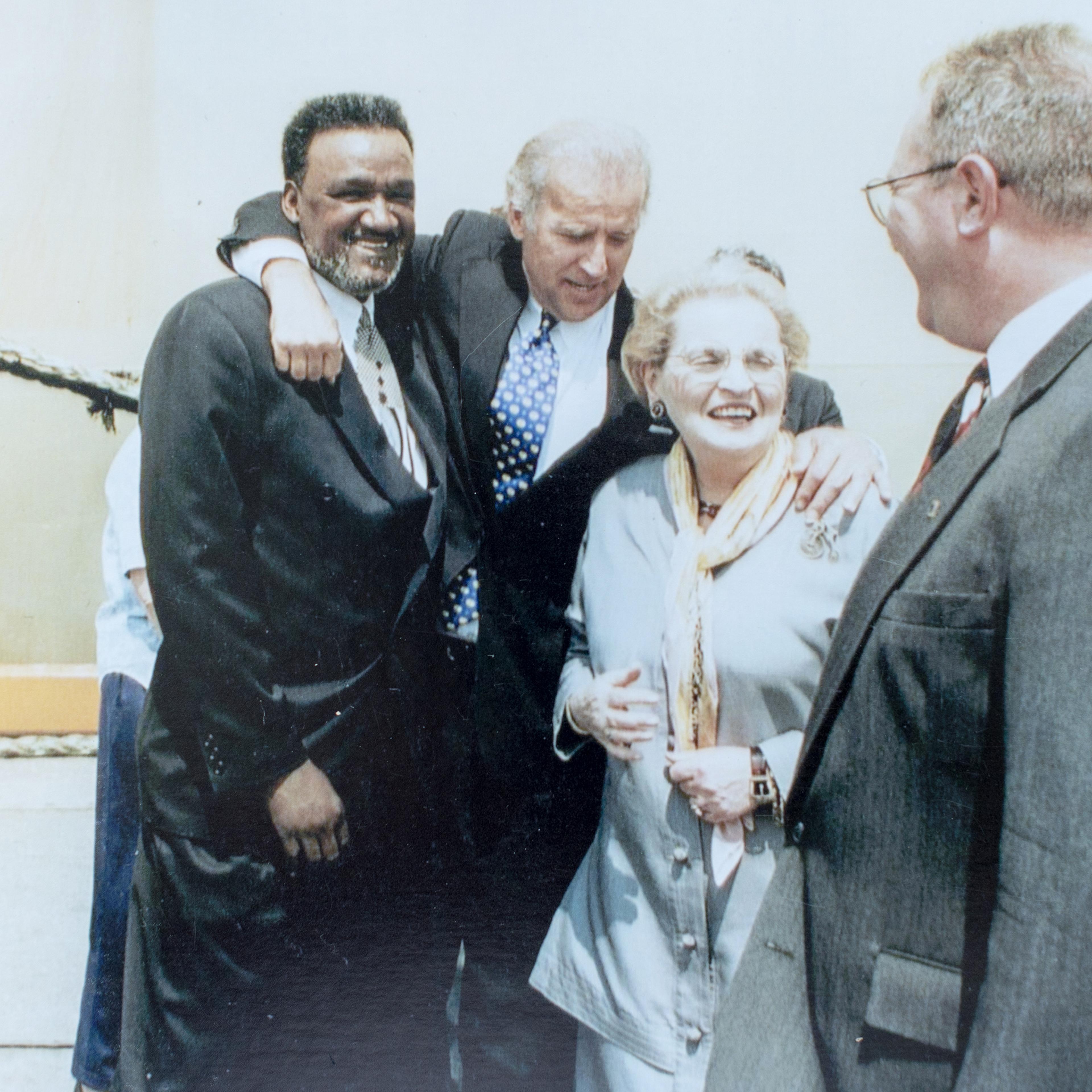 Richard "Mouse" Smith, left, with President Joe Biden, Madeleine Albright and Adam McBride sometime in the mid '90's. Smith is a Civil Rights leader in Delaware who has been friends with Biden since they were both young and when Biden was a lifeguard at