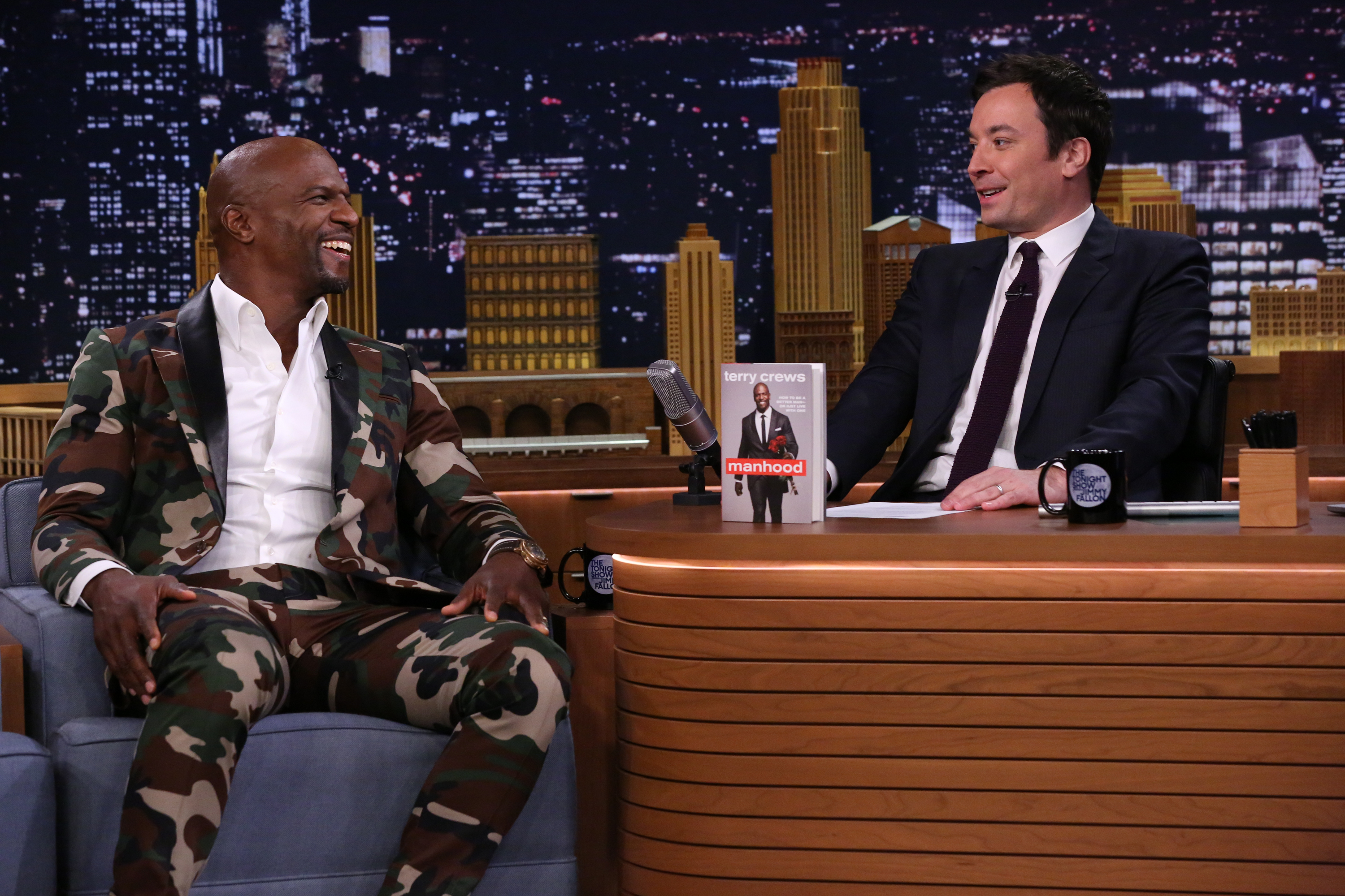 From left: Terry Crews and Jimmy Fallon on The Tonight Show on May 19, 2014.