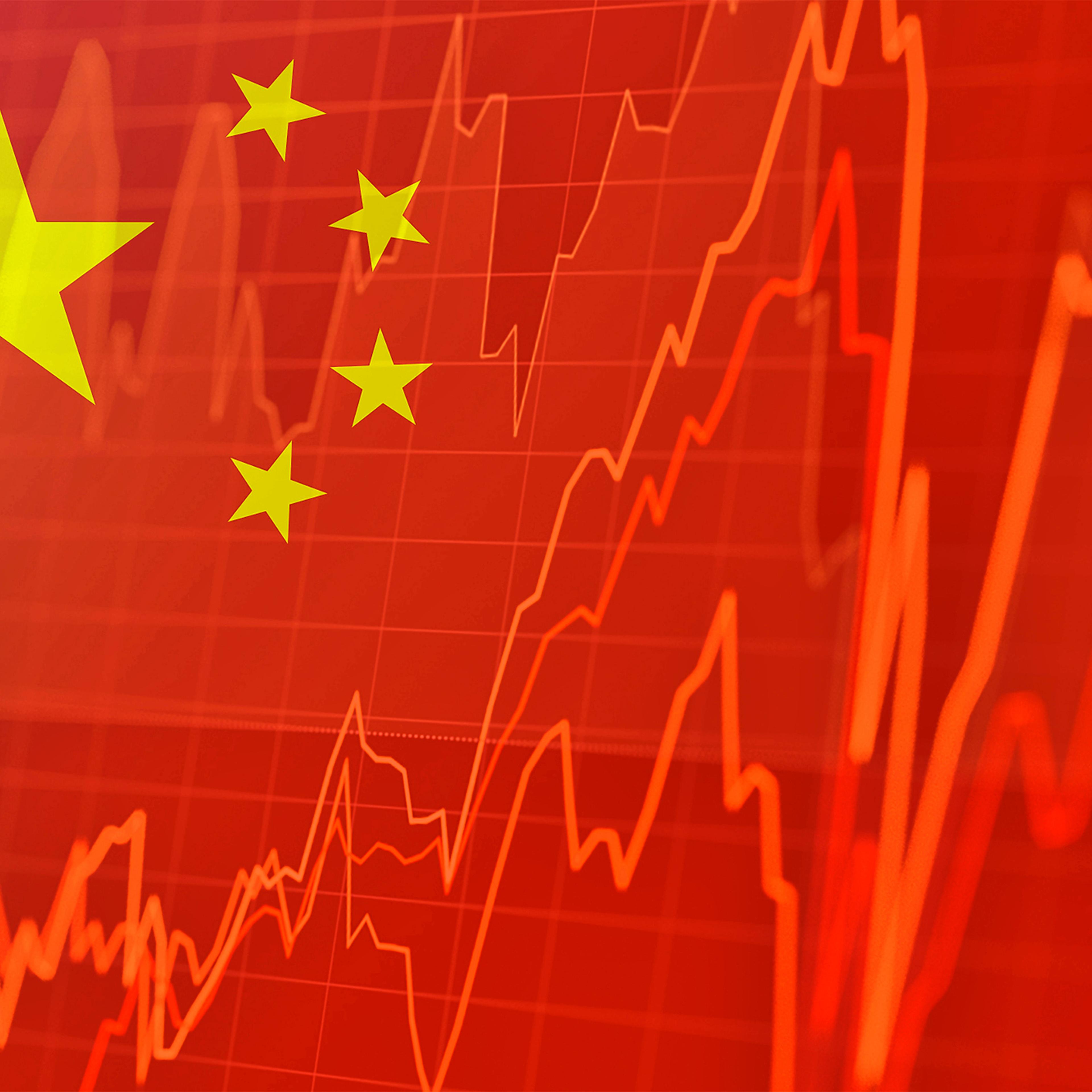 Chinese flag and stock market indicators - concept of Chinese economic trends