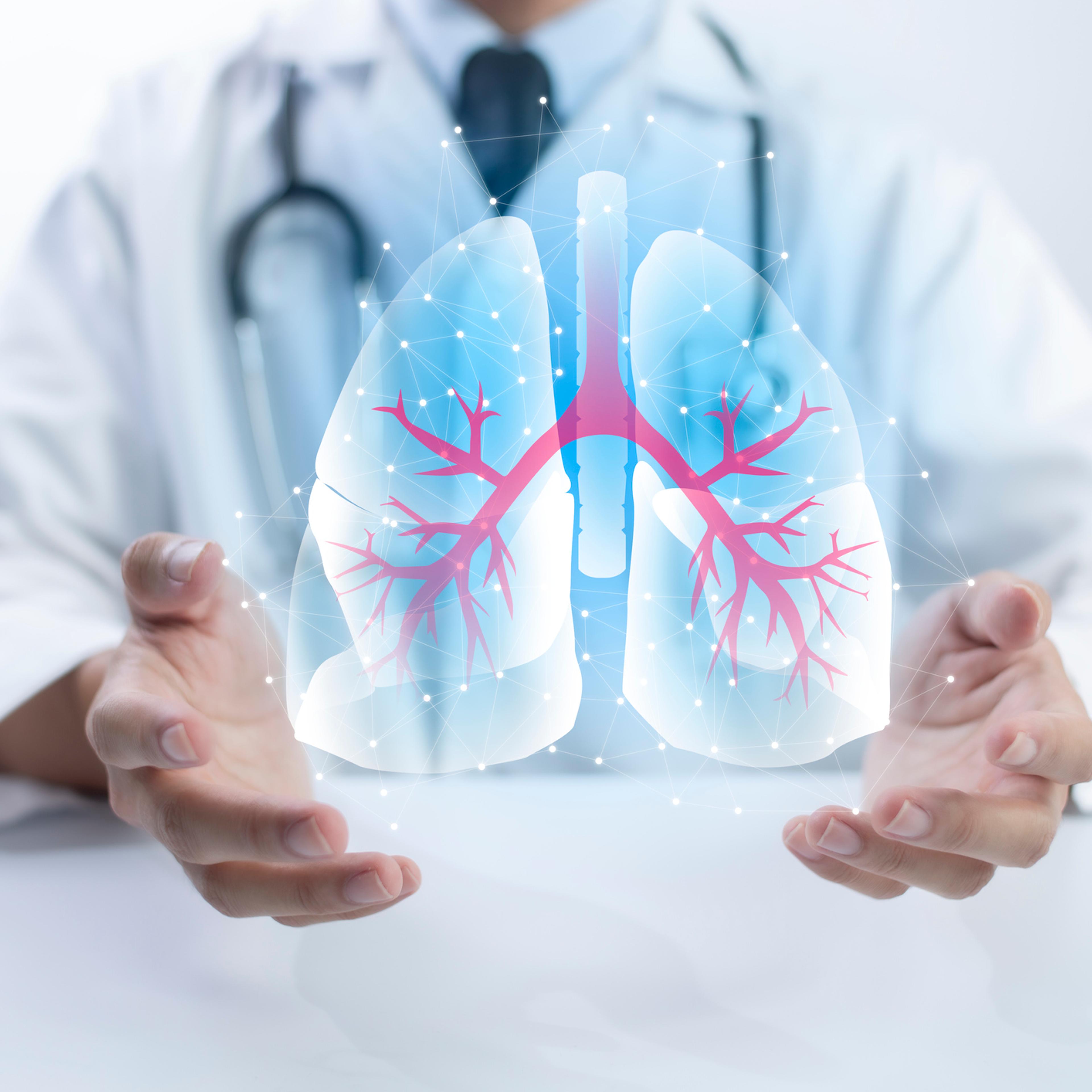 Pulmonologist doctor showing off virtual screen of lung medical issue. Healthcare medical technology concept.