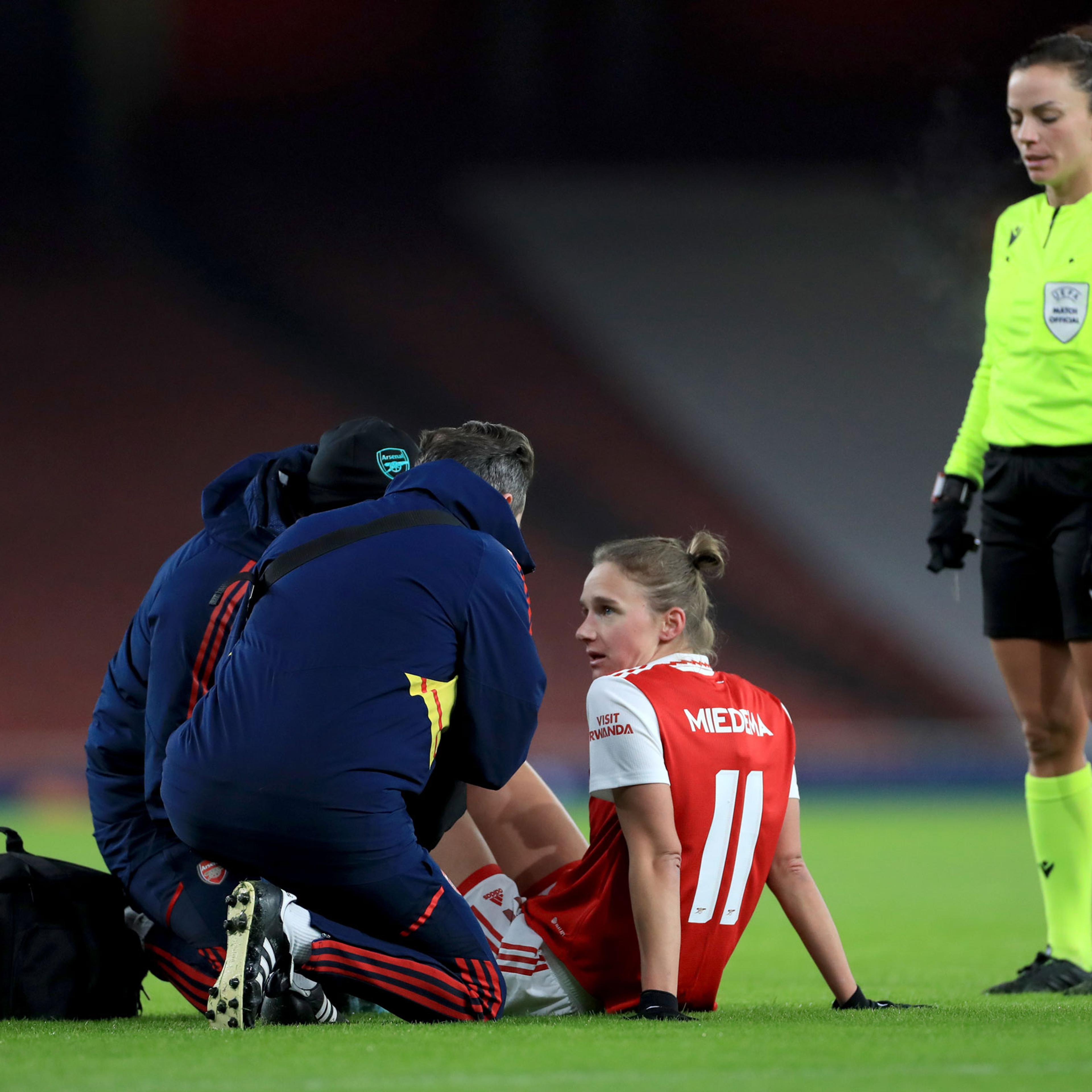 Vivianne Miedema receives medical attention during a UEFA Women’s Champions League match