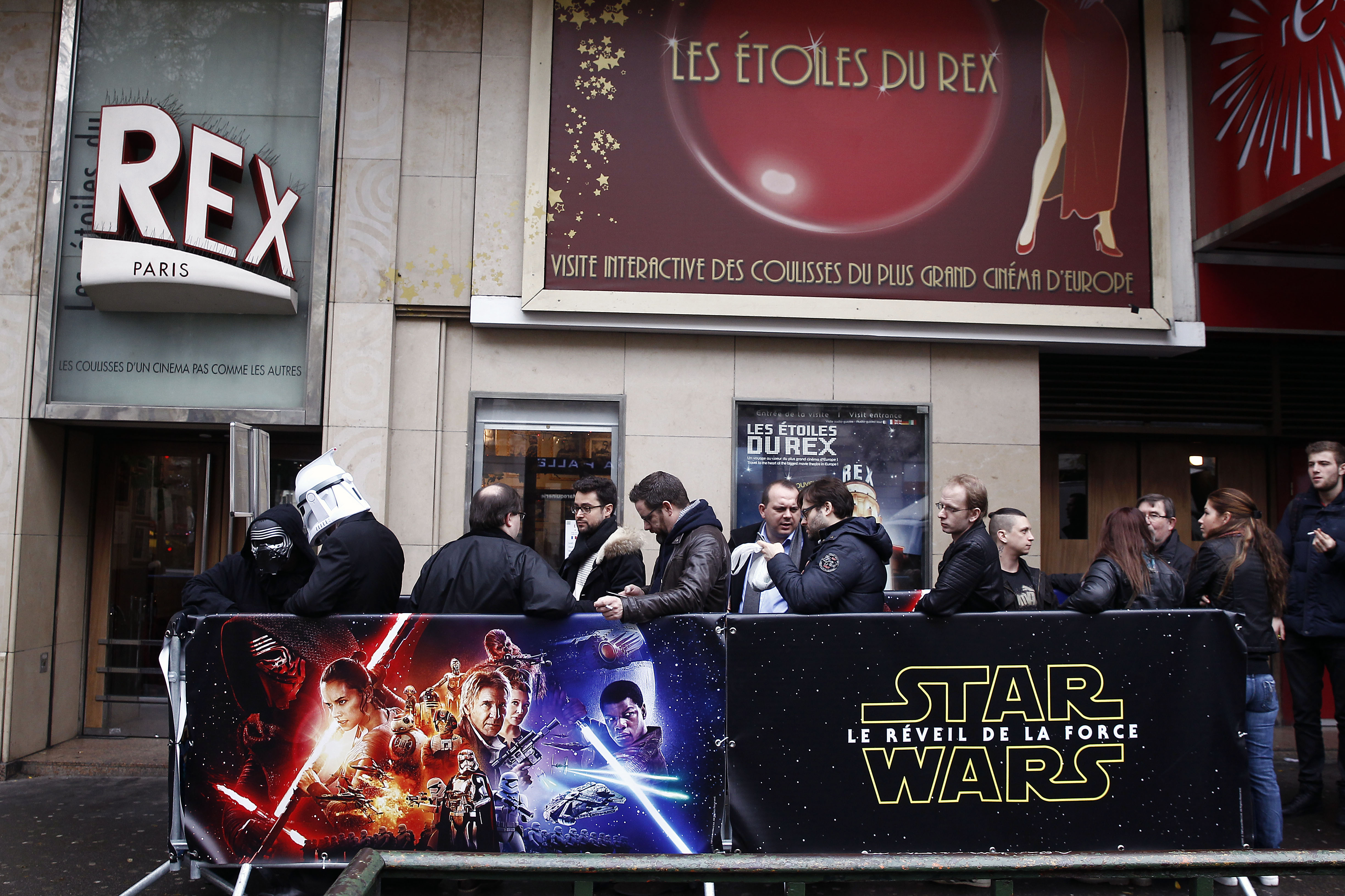 Fans dressed in character costumes from "Star Wars" before the public screening of "The Force Awakens" at the Grand Rex cinema on Dec. 16 in Paris.