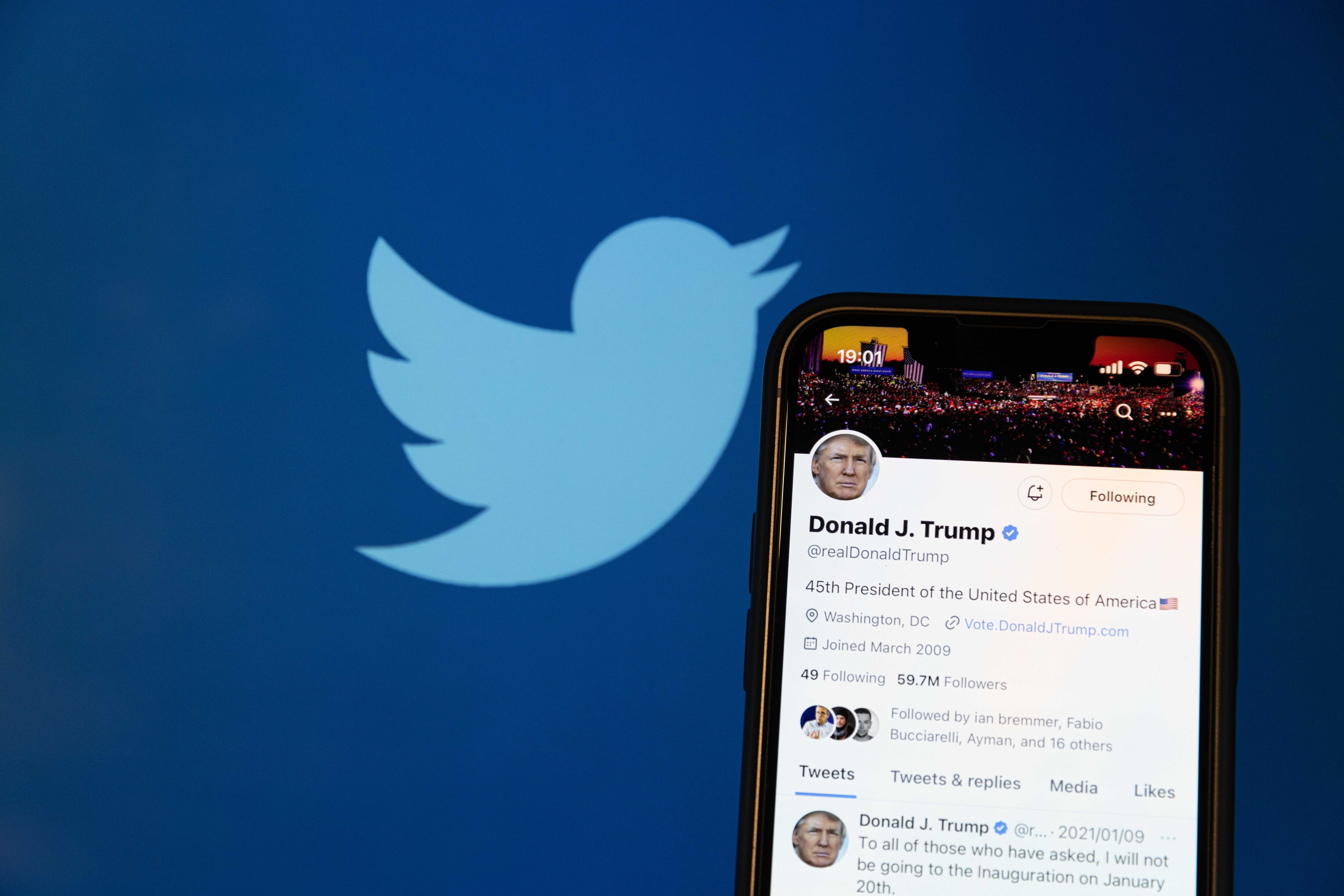 A photo illustration shows the reactivated Twitter profile of former U.S. President Donald Trump. Elon Musk reinstated his account on the social media platform on Nov. 20, 2022.