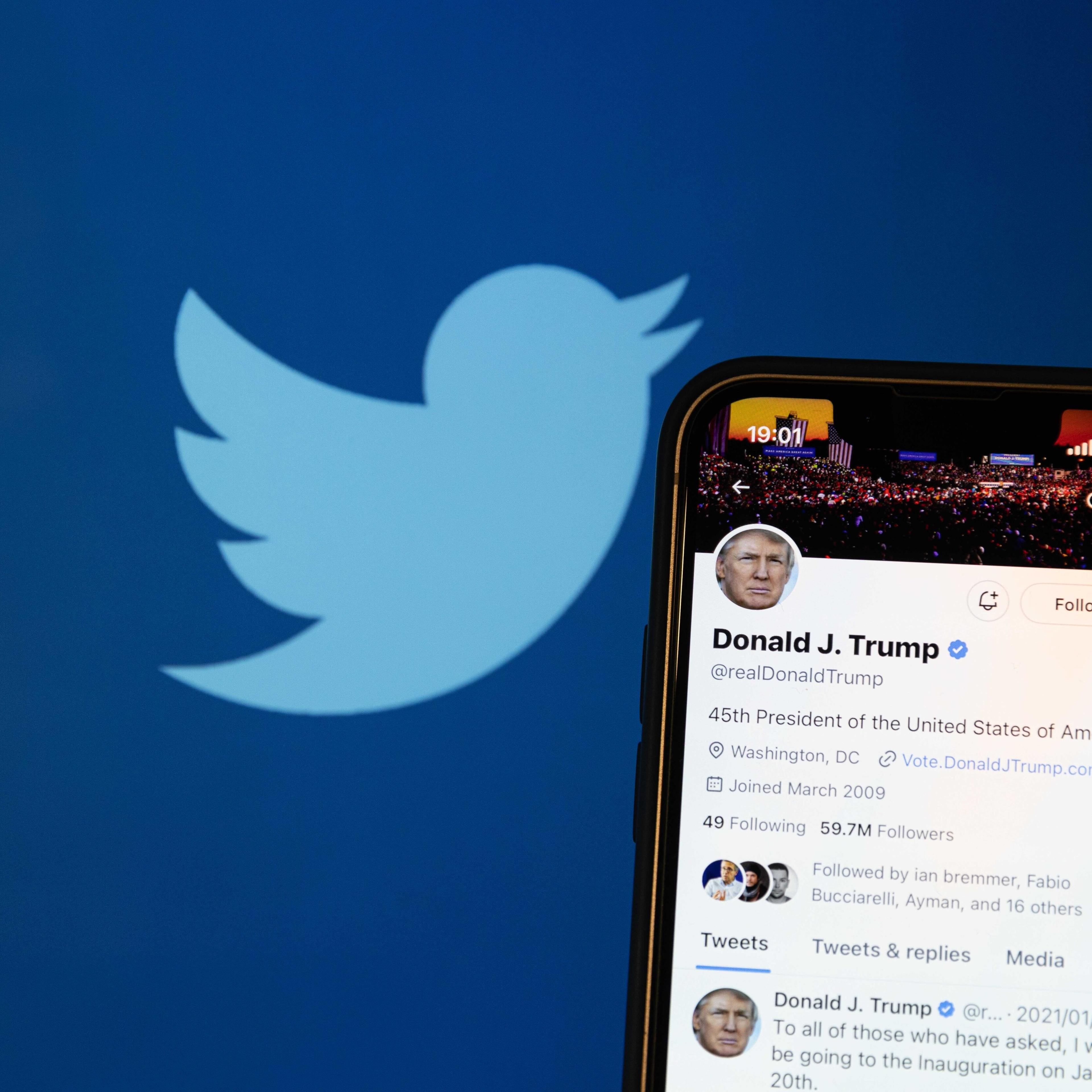 A photo illustration shows the reactivated Twitter profile of former U.S. President Donald Trump. Elon Musk reinstated his account on the social media platform on Nov. 20, 2022.