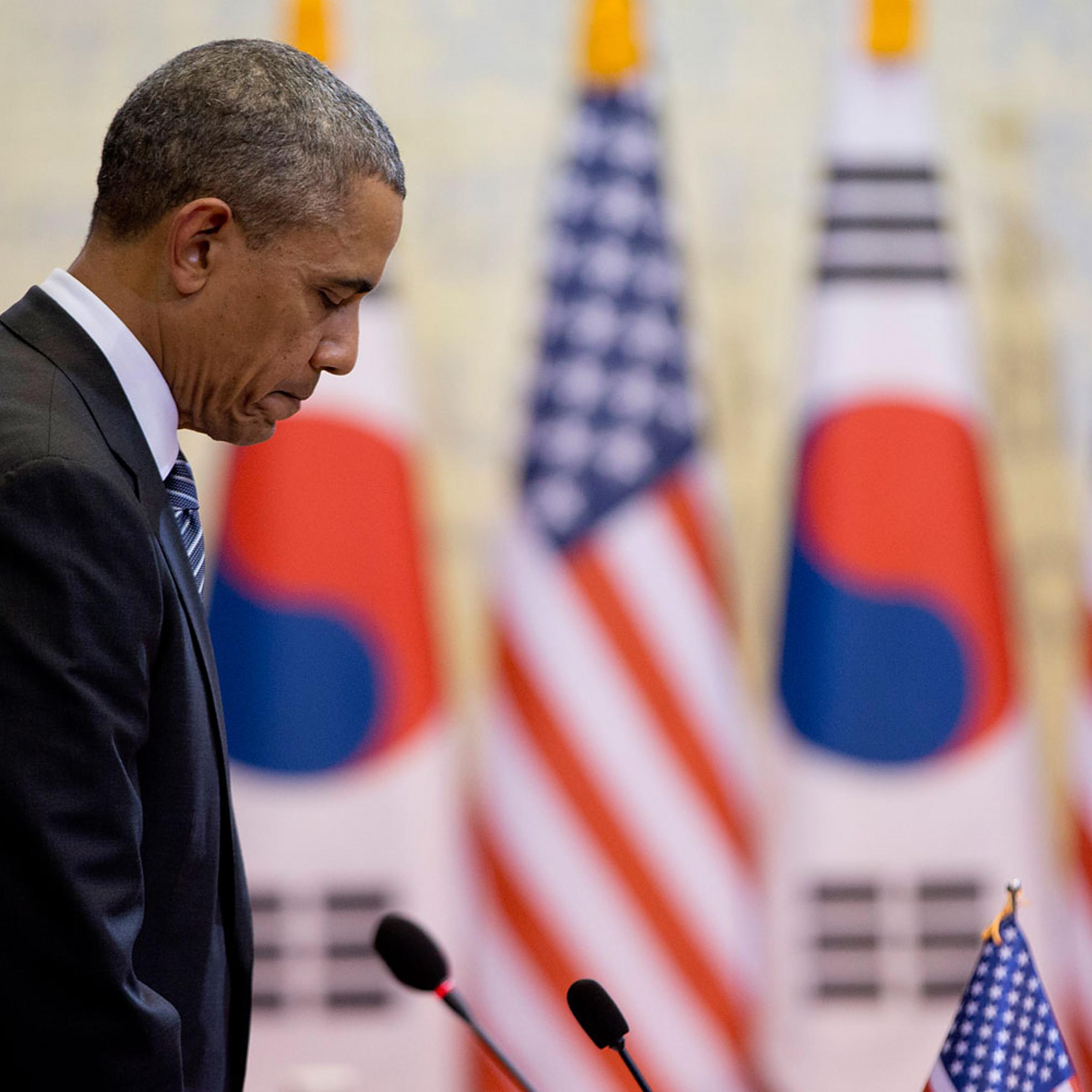 President Obama pauses for a moment of silence for those who died in the ferry disaster as Obama and South Korean President Park Geun-hye, participate in the bilateral meetings at the Blue House, April 25, 2014, in Seoul.