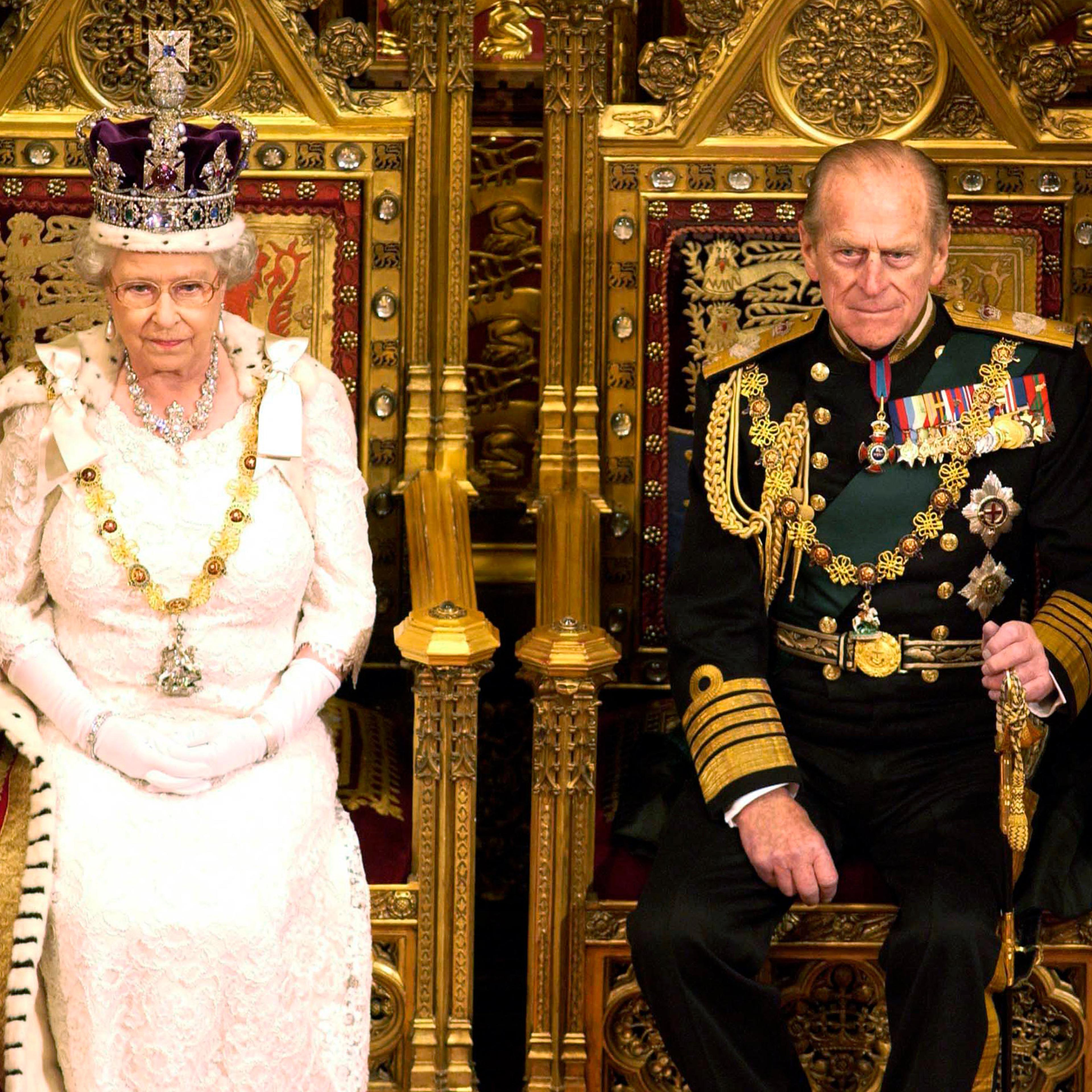 Queen Elizabeth II sits with Prince Philip in the House of Lords during the State Opening of Parliament on Nov. 26, 2003.