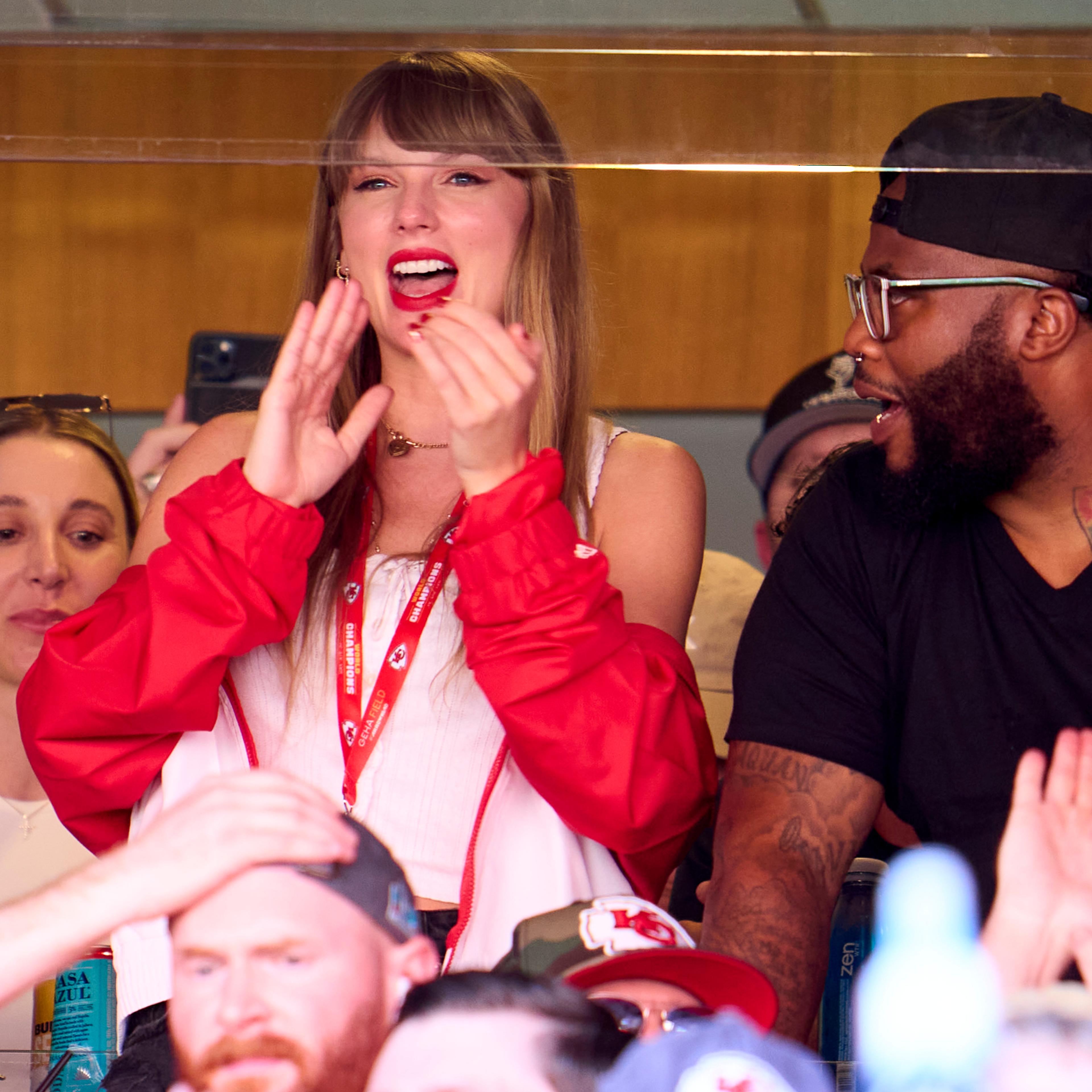 Taylor Swift cheering at the Kansas City Chiefs game