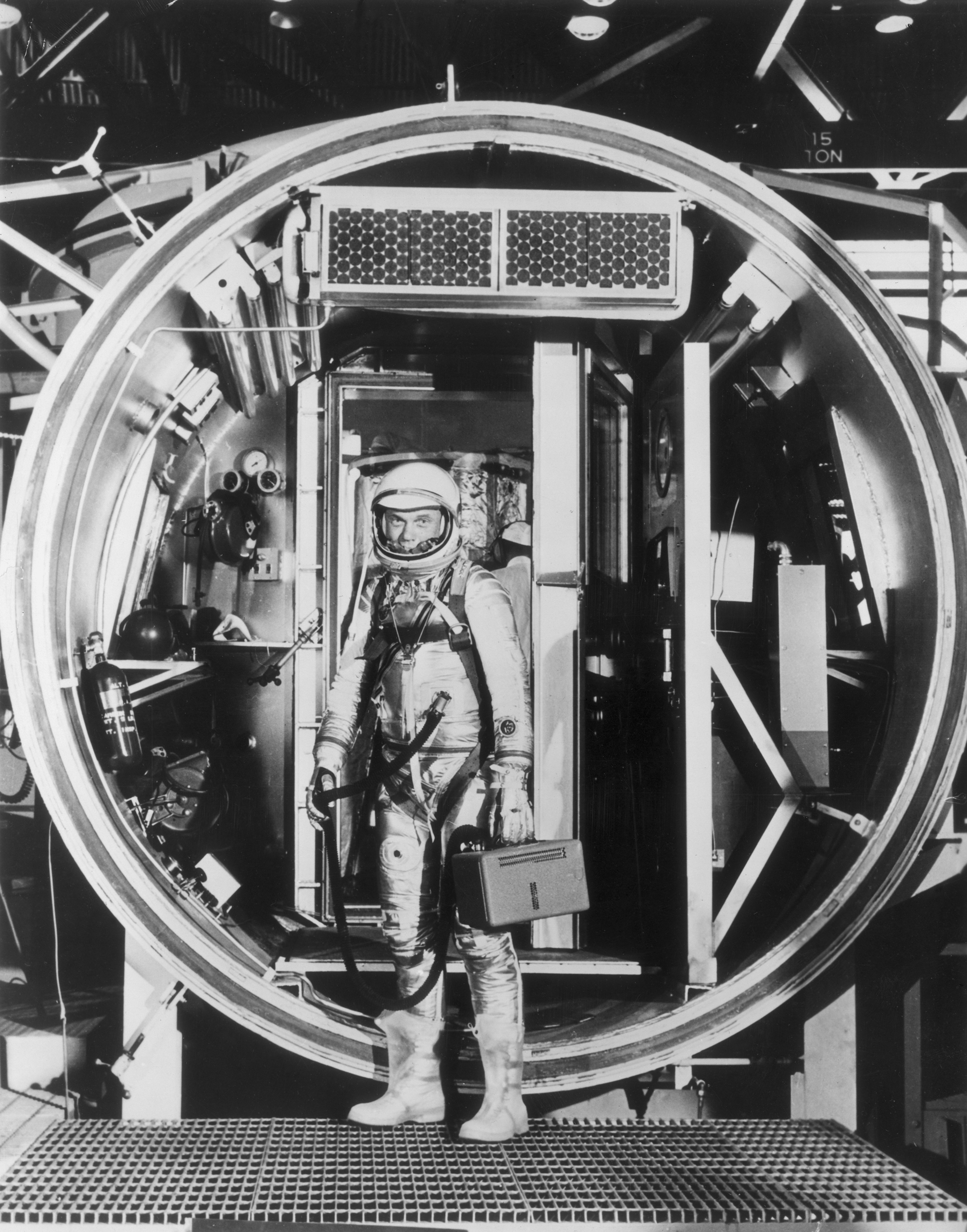 High-Tech Testing Glenn, in 1962, in a fully pressurized suit, prepares to enter an altitude chamber, which simulates air pressure at various stages of flight.
