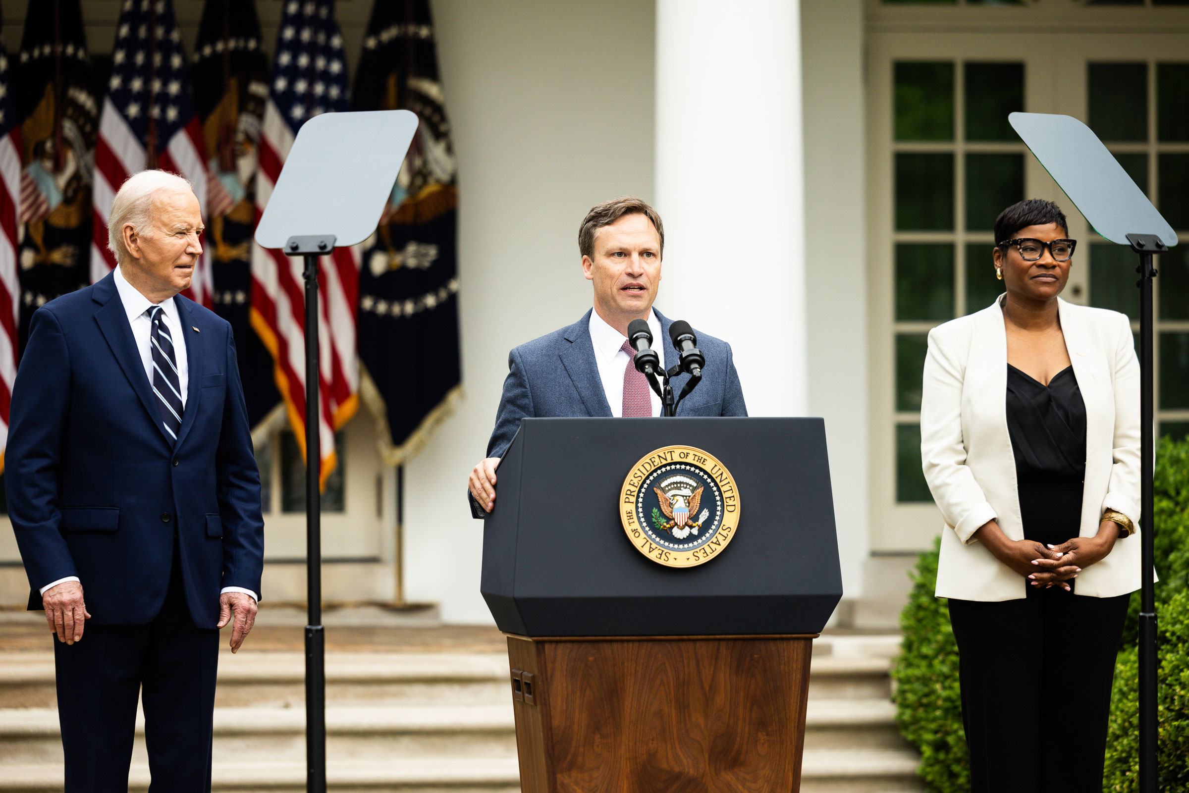 U.S. President Joe Biden, Jesse Gary, president and chief executive officer of Century Aluminum Company, and Roxanne Brown, vice president of United Steelworkers, at the White House