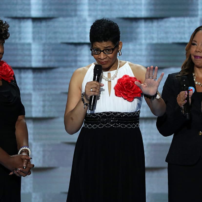 Mothers of the Movement Geneva Reed-Veal (C), mother of Sandra Bland delivers remarks as Lucia McBath (R), mother of Jordan Davis; and Gwen Carr, mother of Eric Garner look on during the second day of the Democratic National Convention at the Wells Fargo