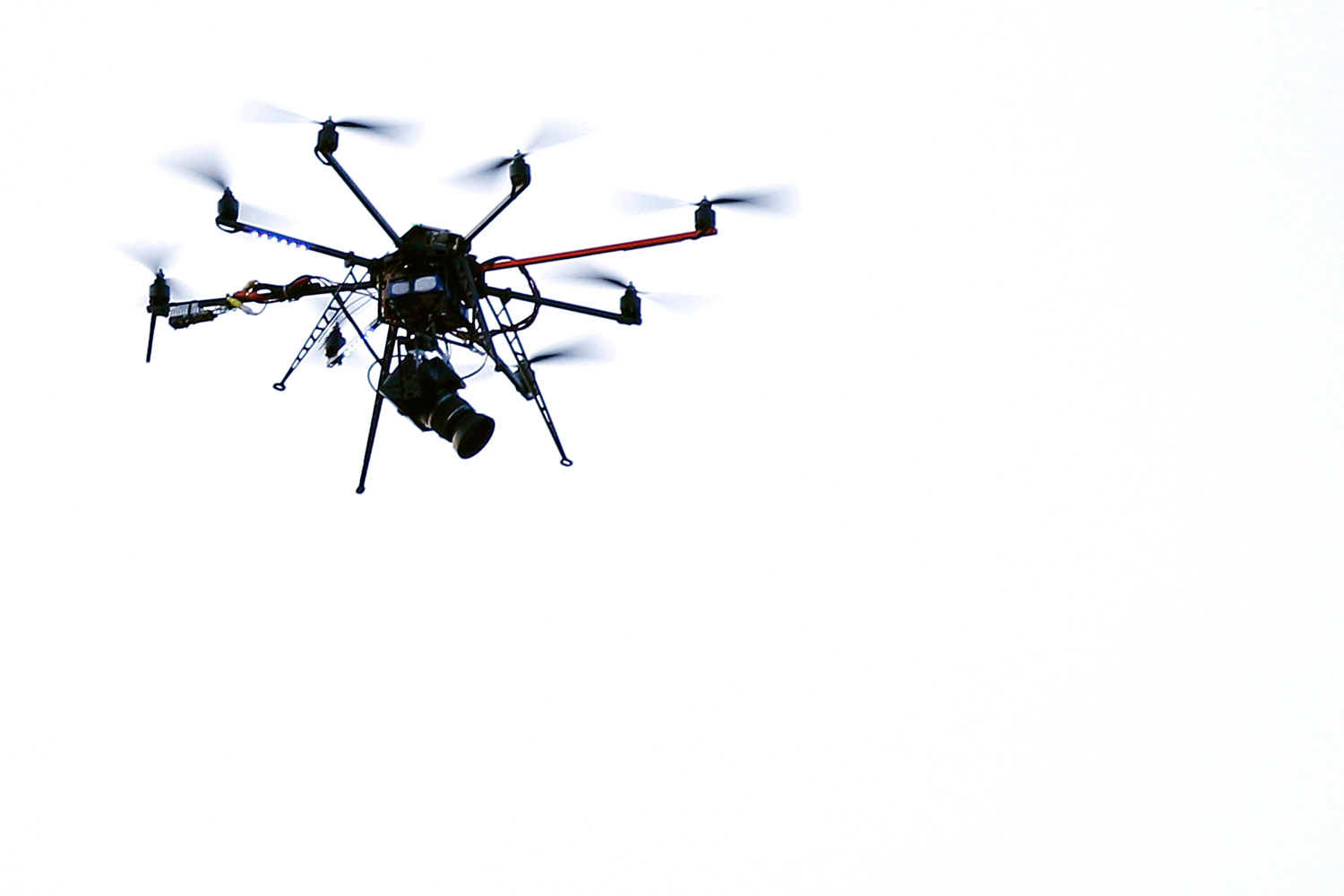 A remote camera mounted on an Octocopter flies over the red carpet during Rome Film Festival on October 30, 2011.