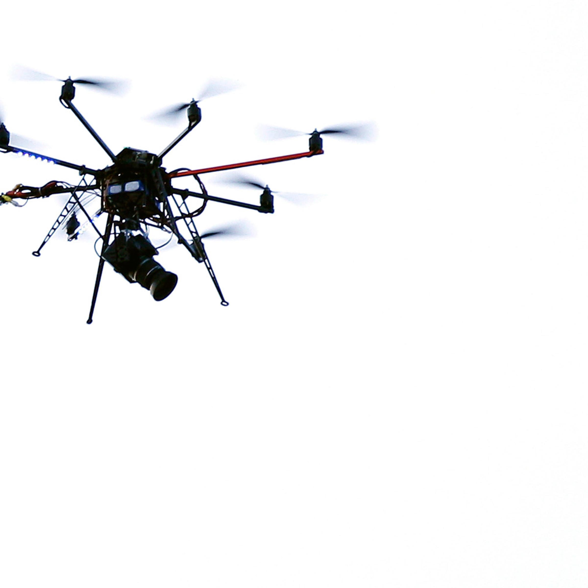 A remote camera mounted on an Octocopter flies over the red carpet during Rome Film Festival on October 30, 2011.
